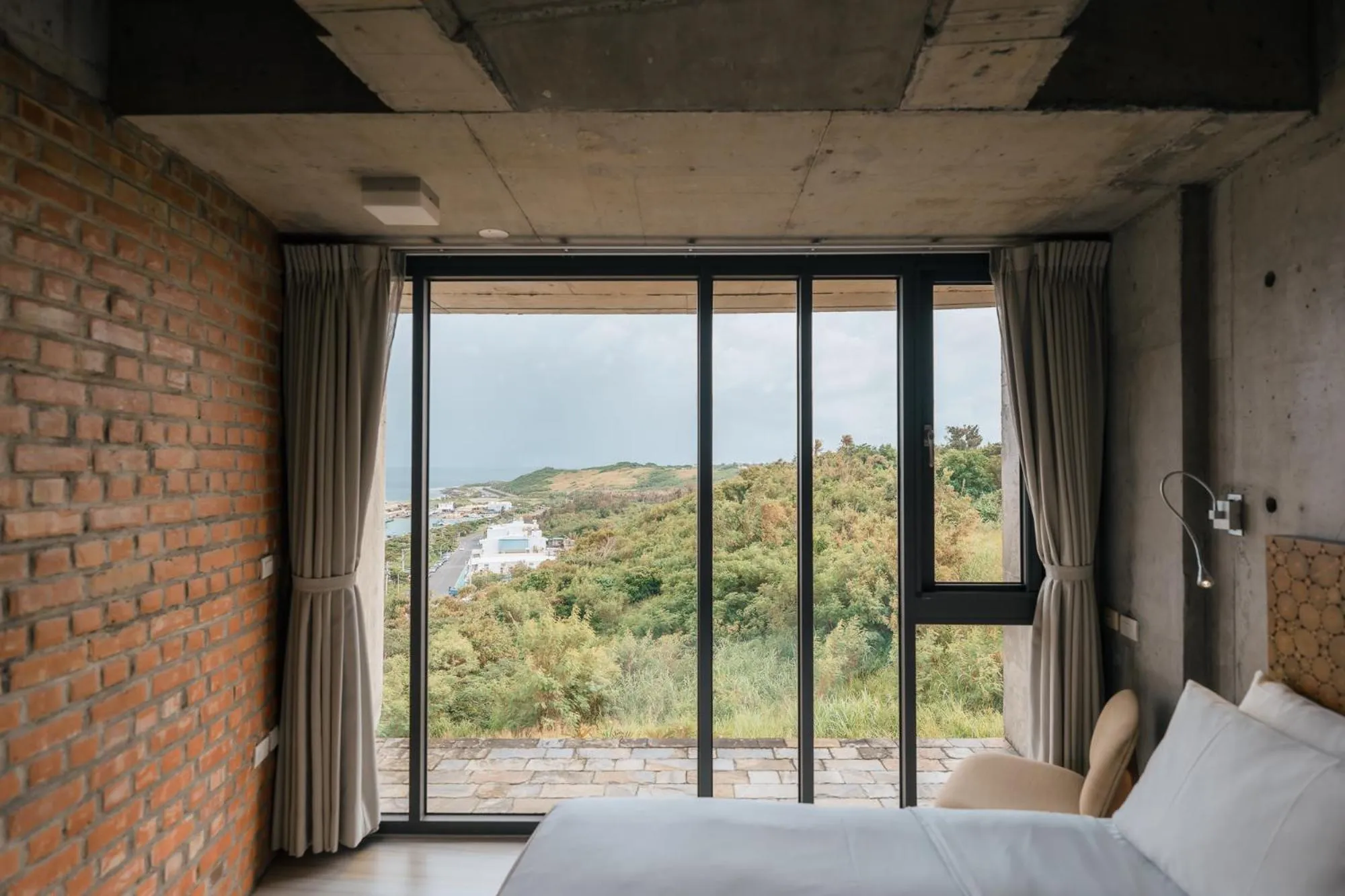 Photo of the whole room, Bed in The Light