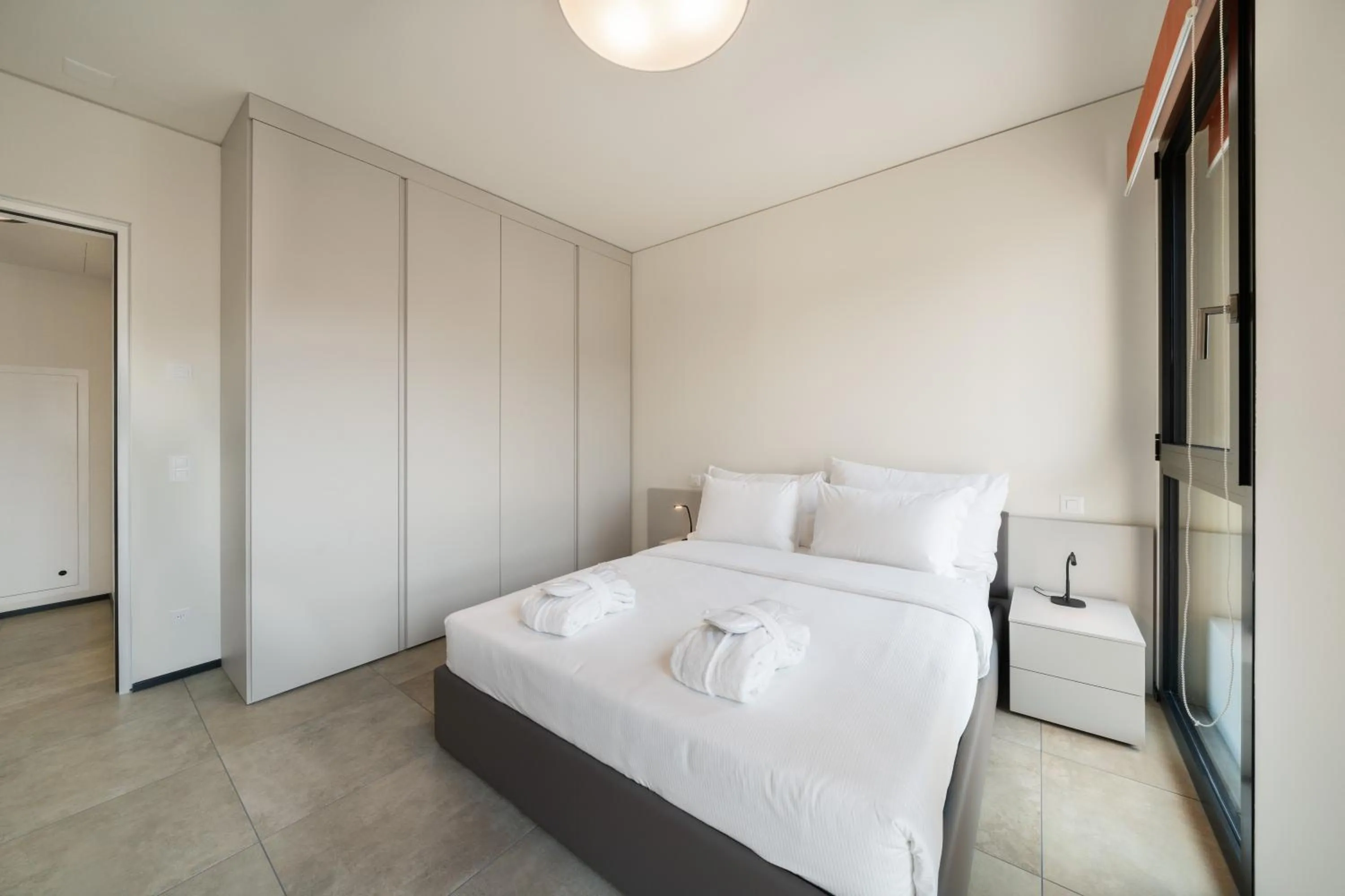 Bed in Swiss Hotel Apartments - Lugano