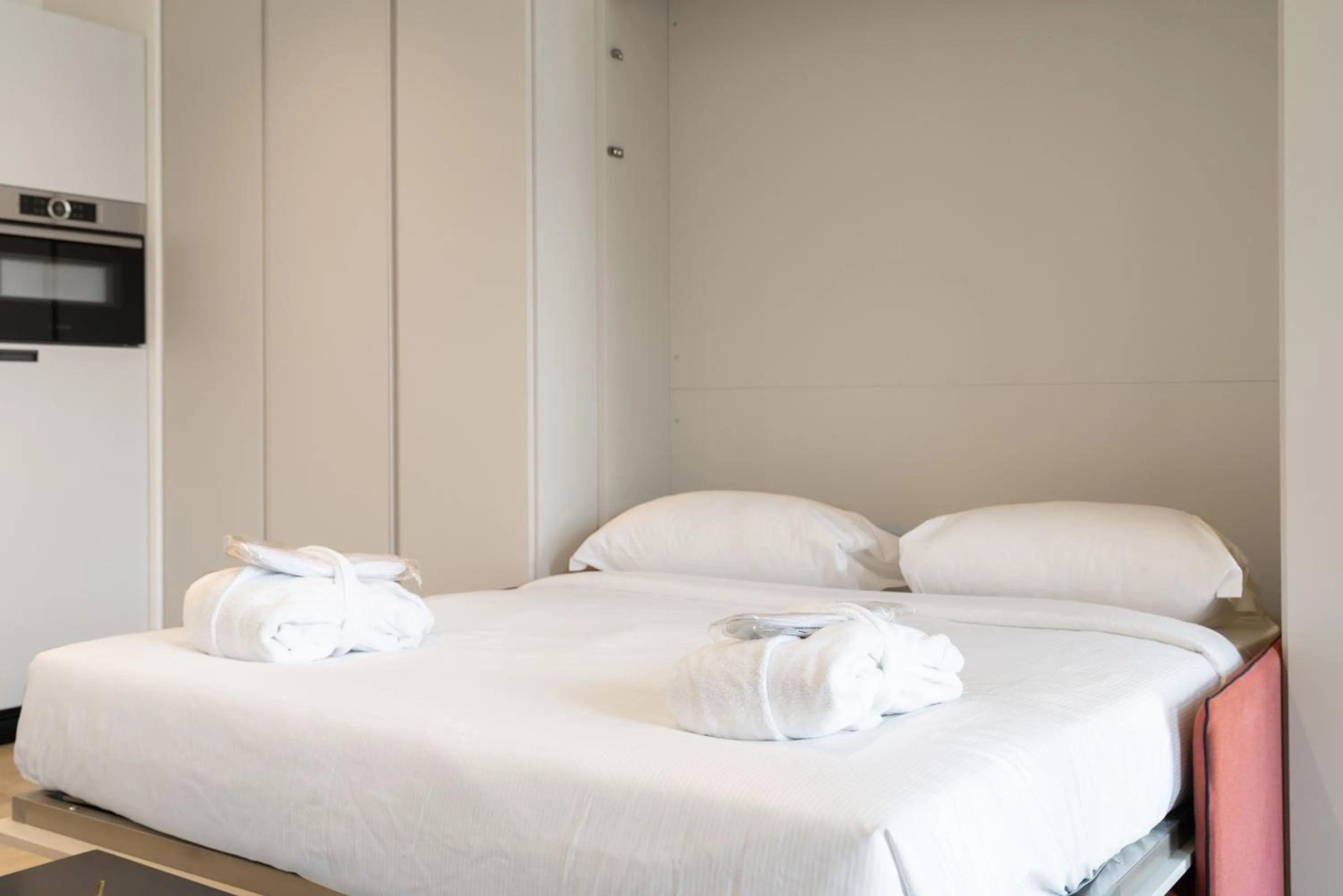 Bed in Swiss Hotel Apartments - Lugano