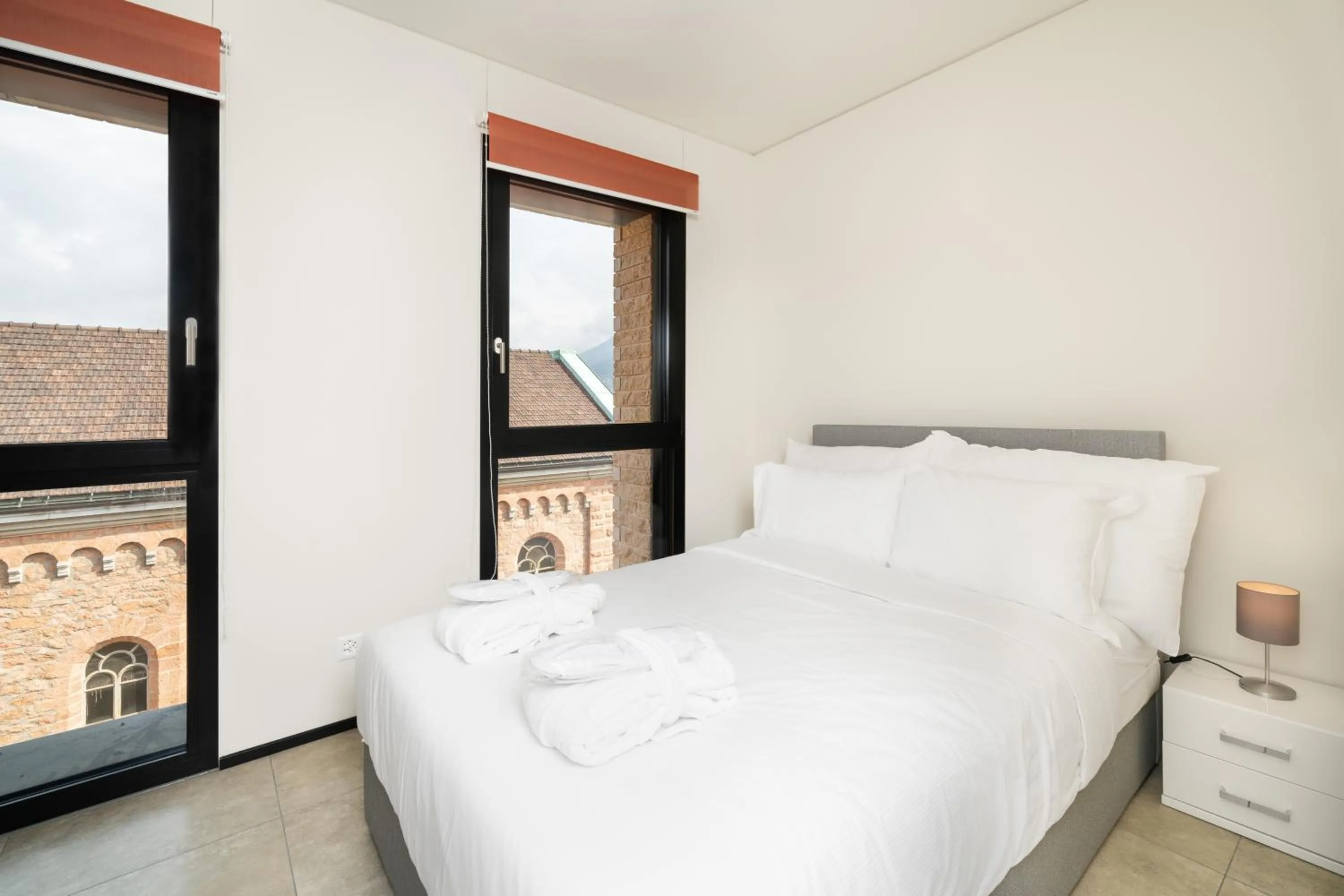 Bed in Swiss Hotel Apartments - Lugano