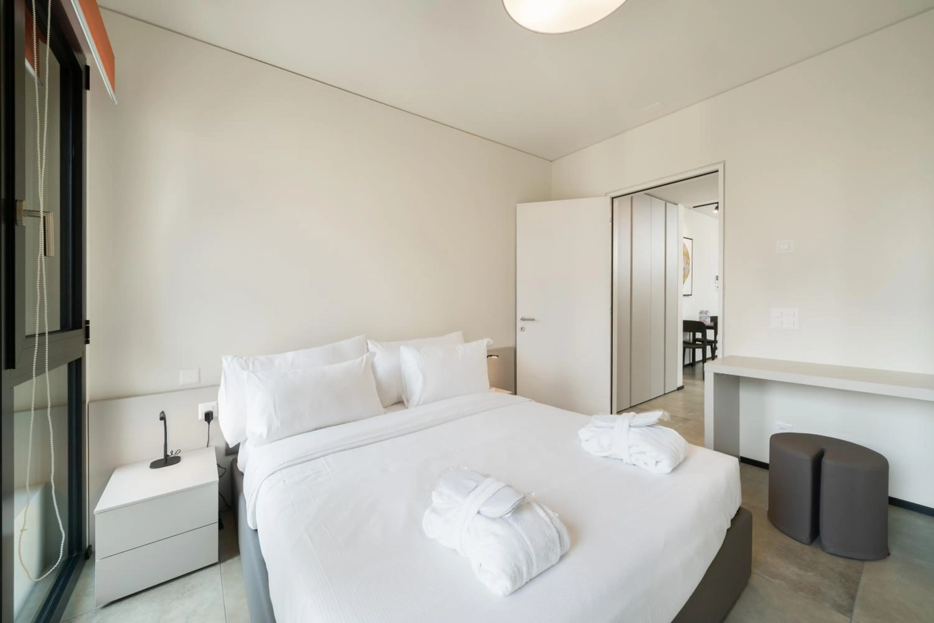Bed in Swiss Hotel Apartments - Lugano