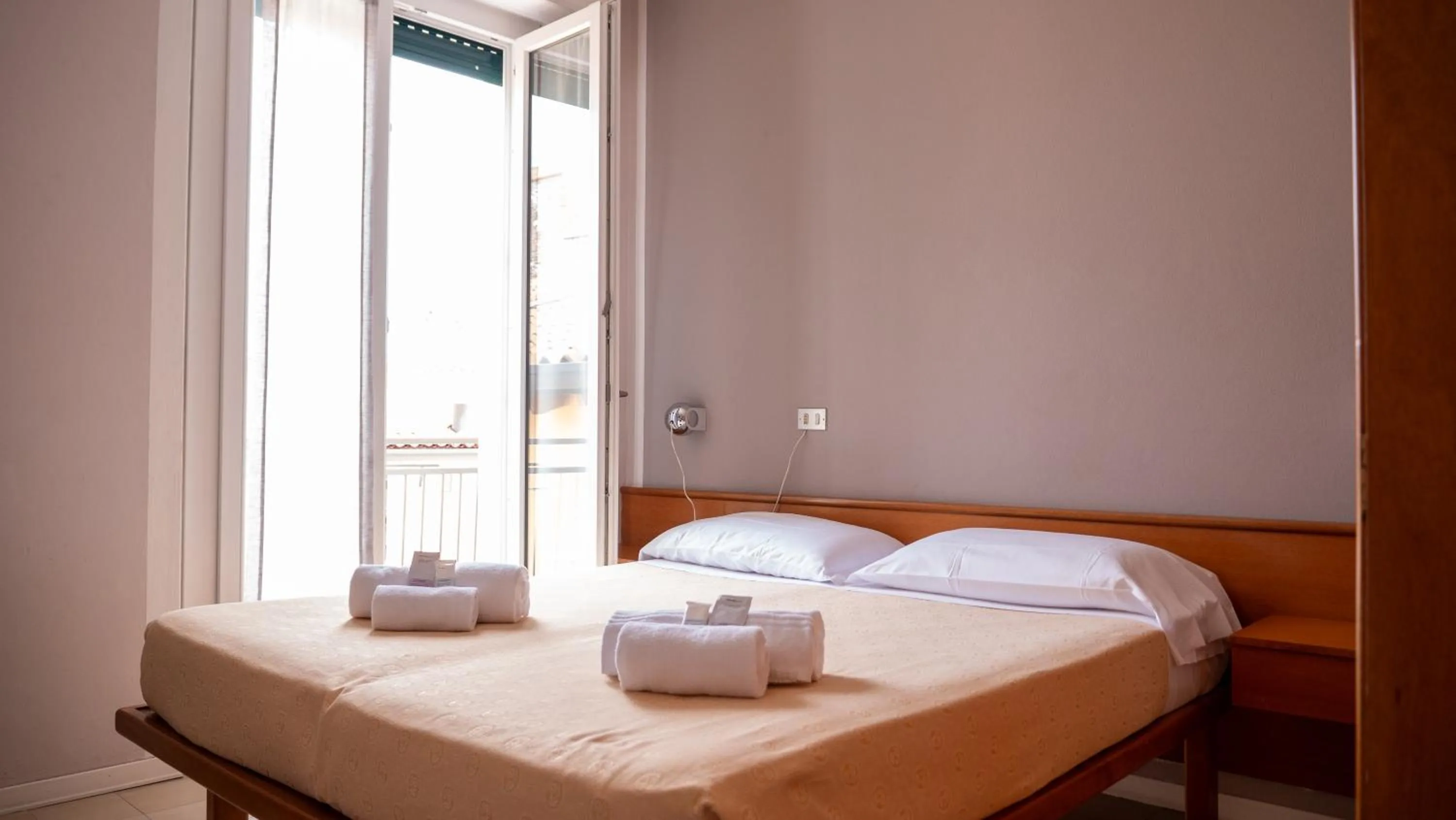 Bed in Albergo Tecla