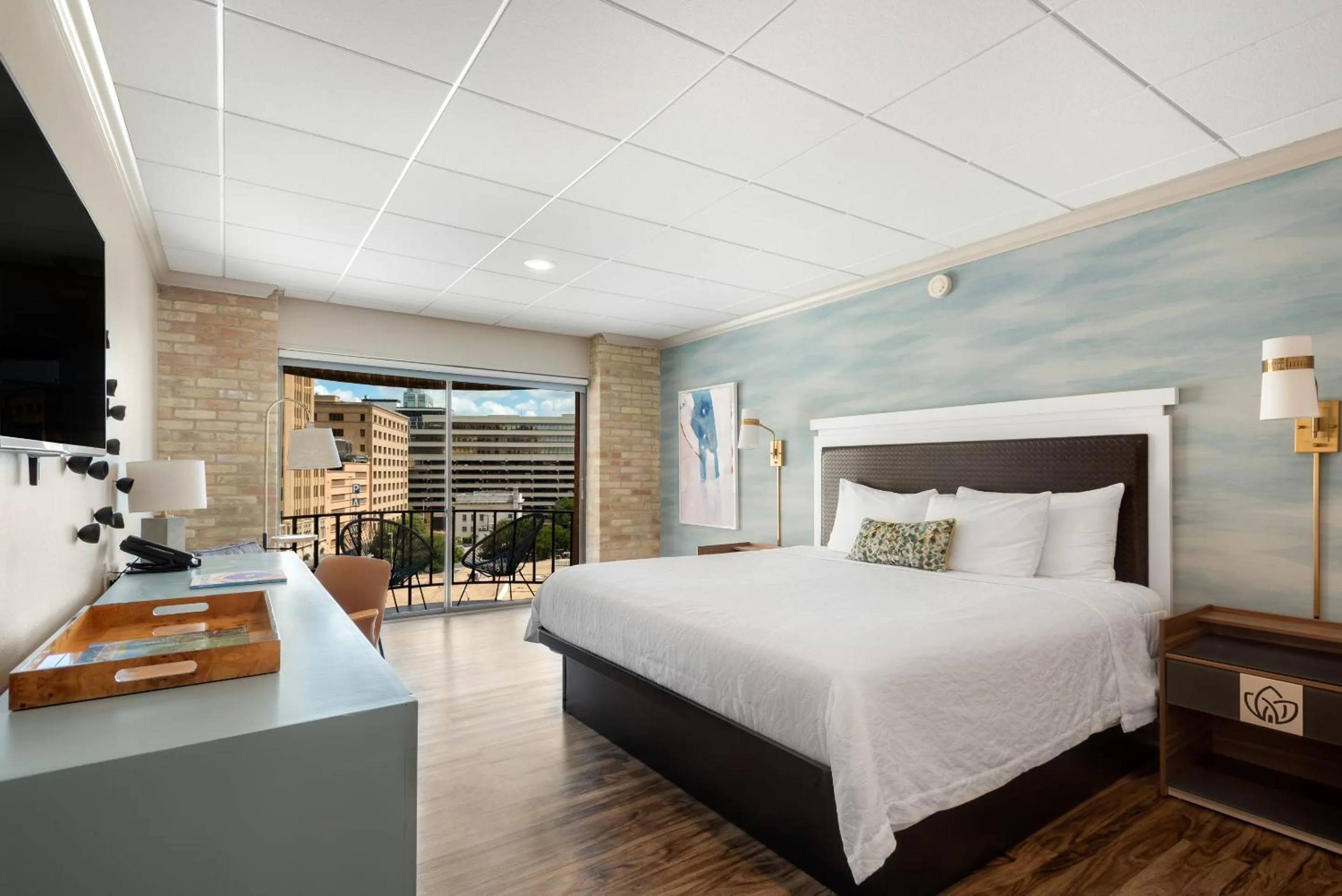 Bed in Riverwalk Plaza Hotel