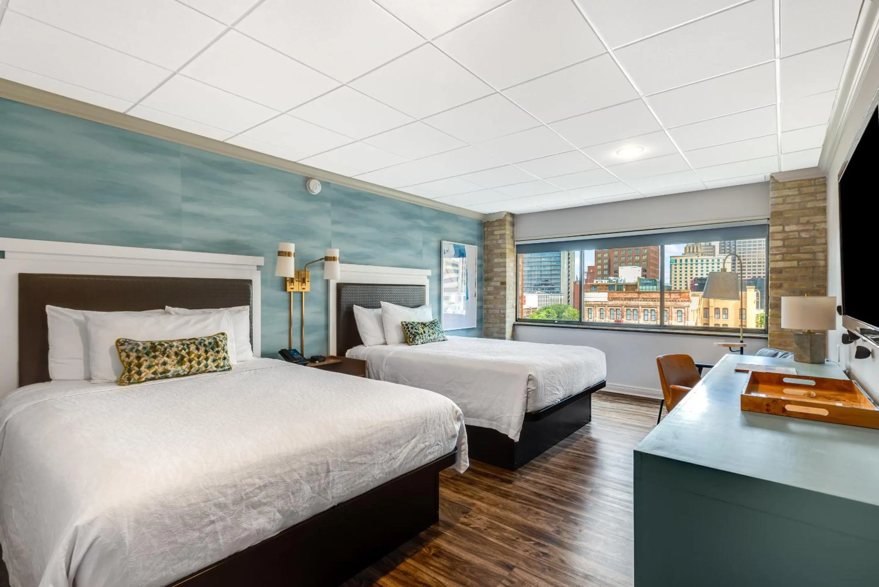 Bed in Riverwalk Plaza Hotel