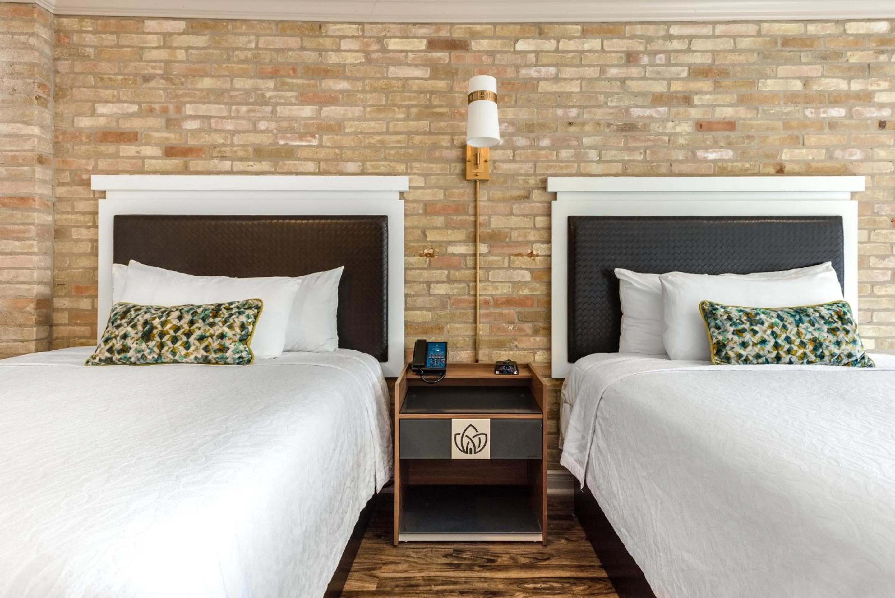 Bed in Riverwalk Plaza Hotel