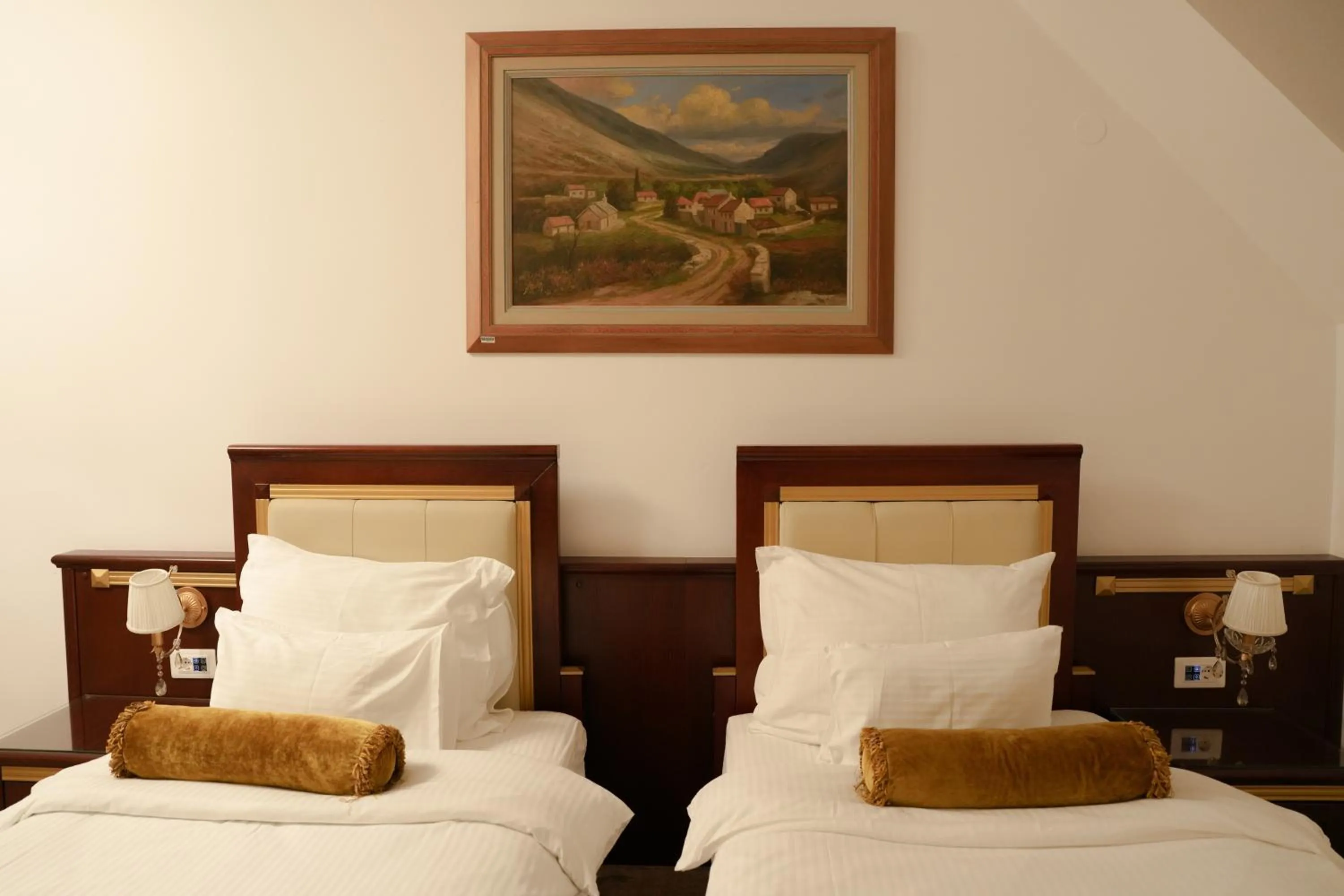 Bed in Integra Hotel