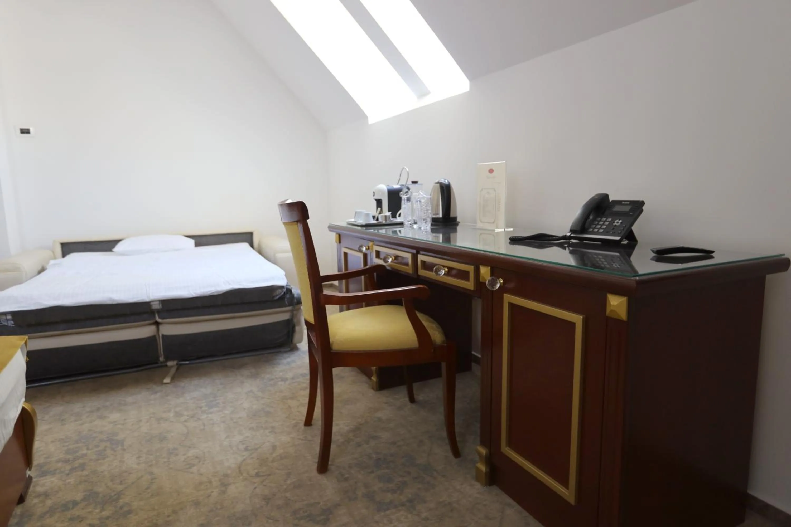 Bed in Integra Hotel