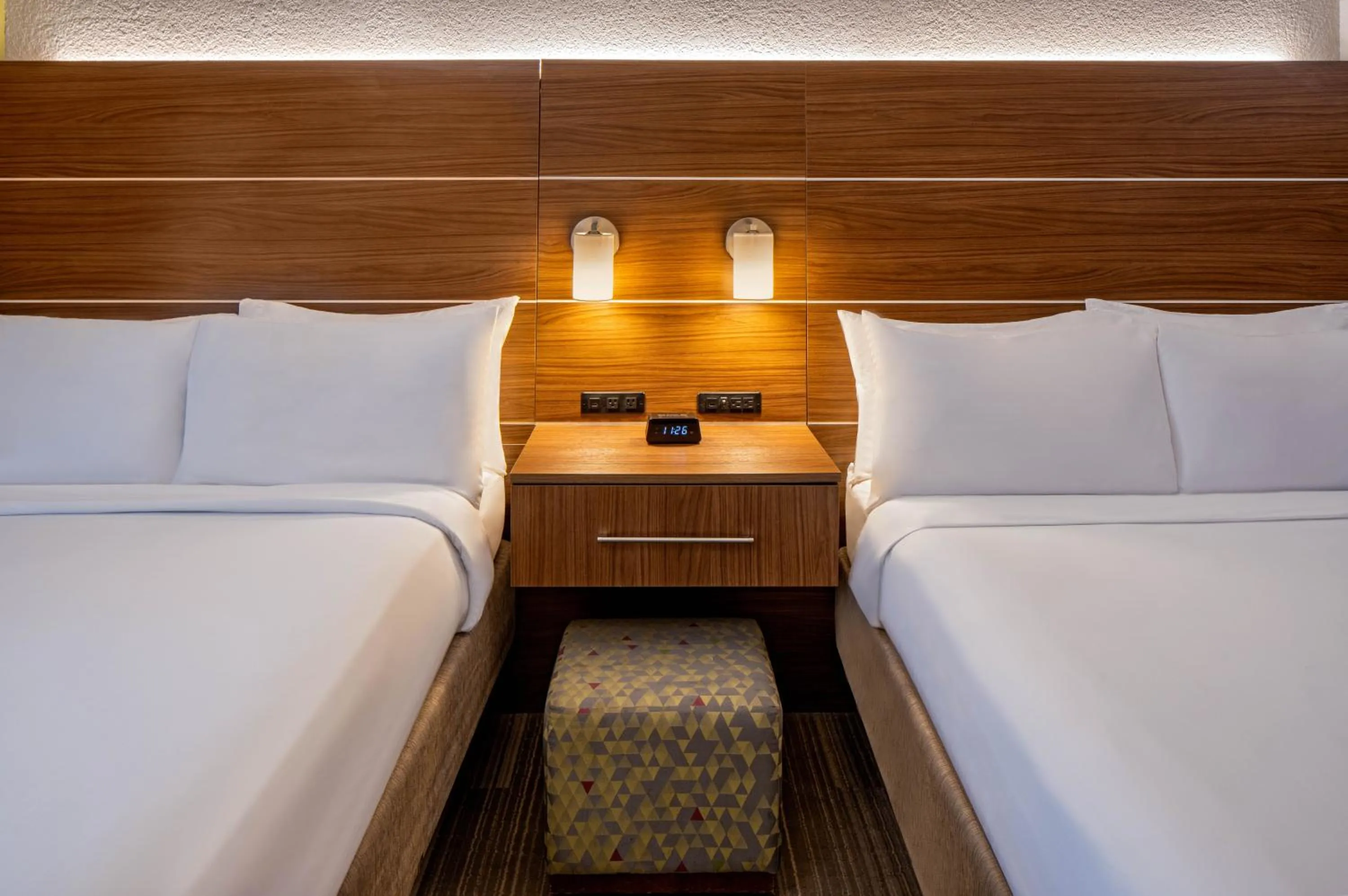 Bed in Holiday Inn Express New Orleans Downtown by IHG