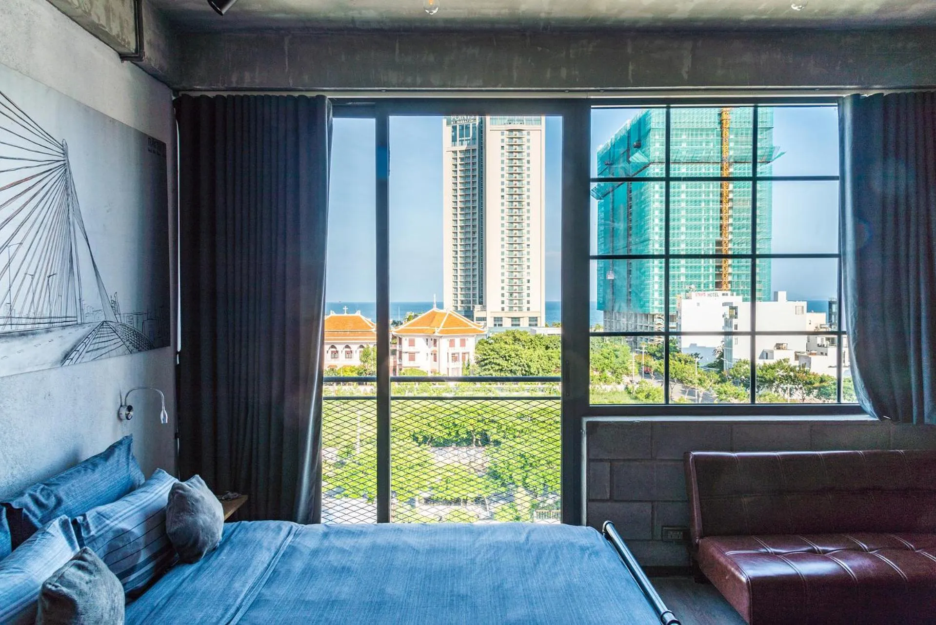 View (from property/room), Bed in Bridges Danang Boutique Hotel