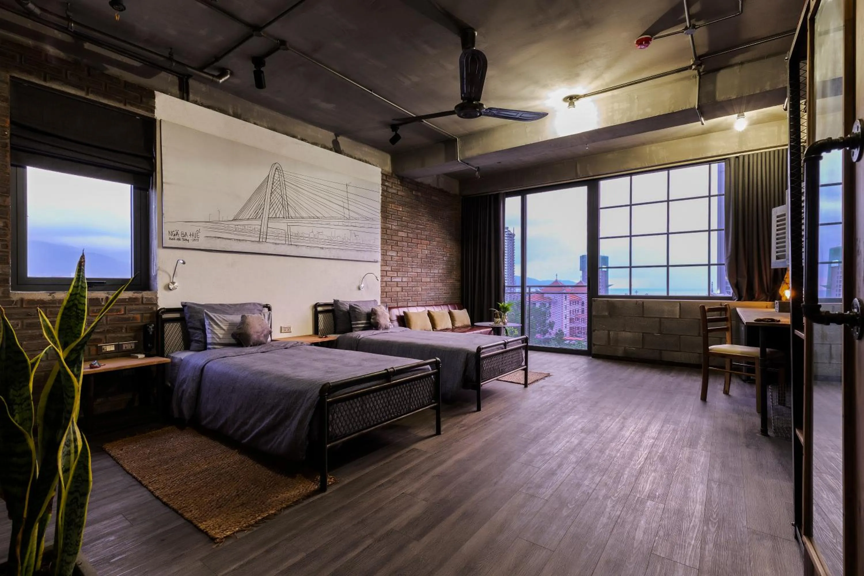 Photo of the whole room, Bed in Bridges Danang Boutique Hotel