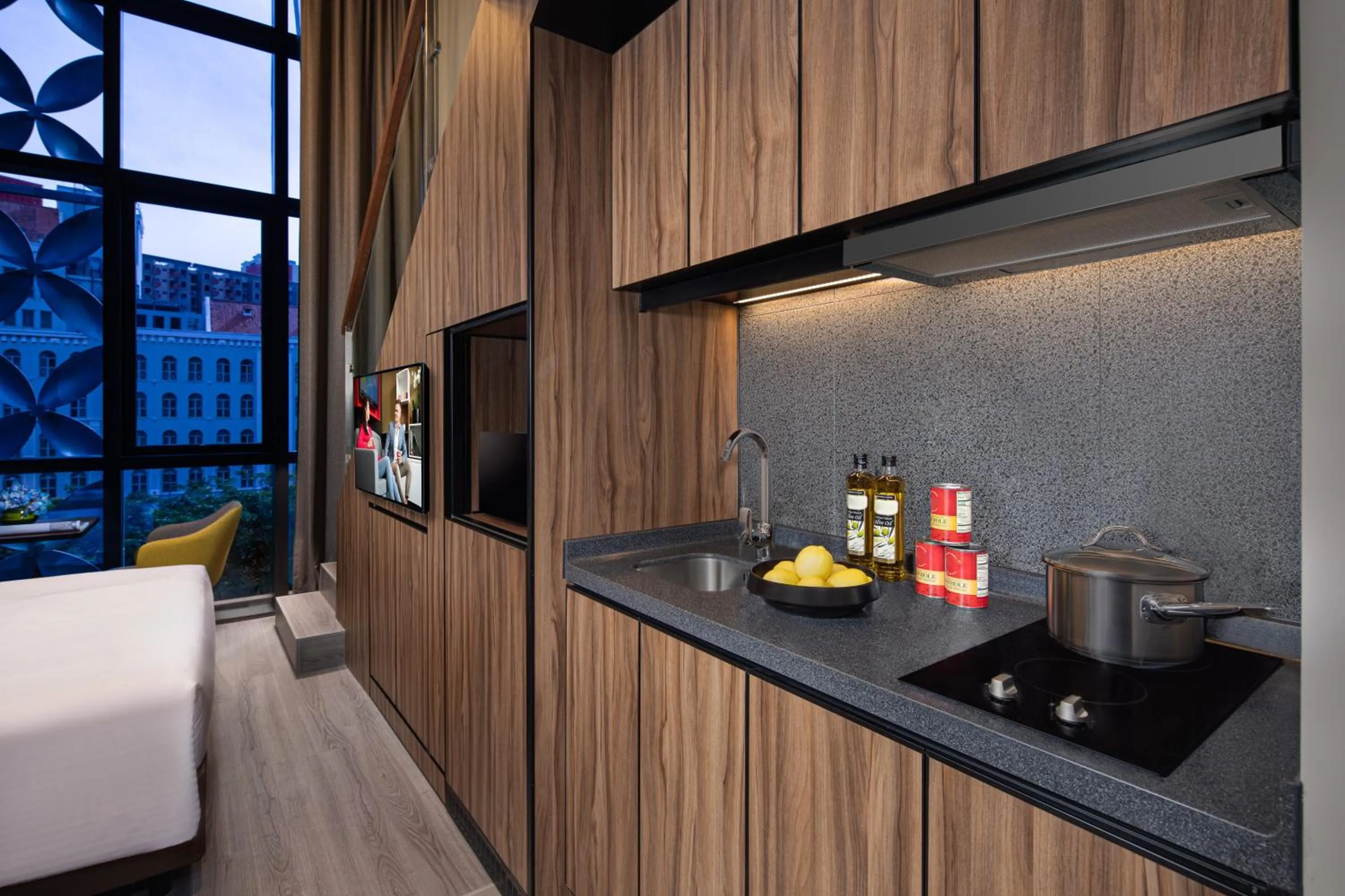 Kitchen or kitchenette, Bed in Citadines Rochor Singapore