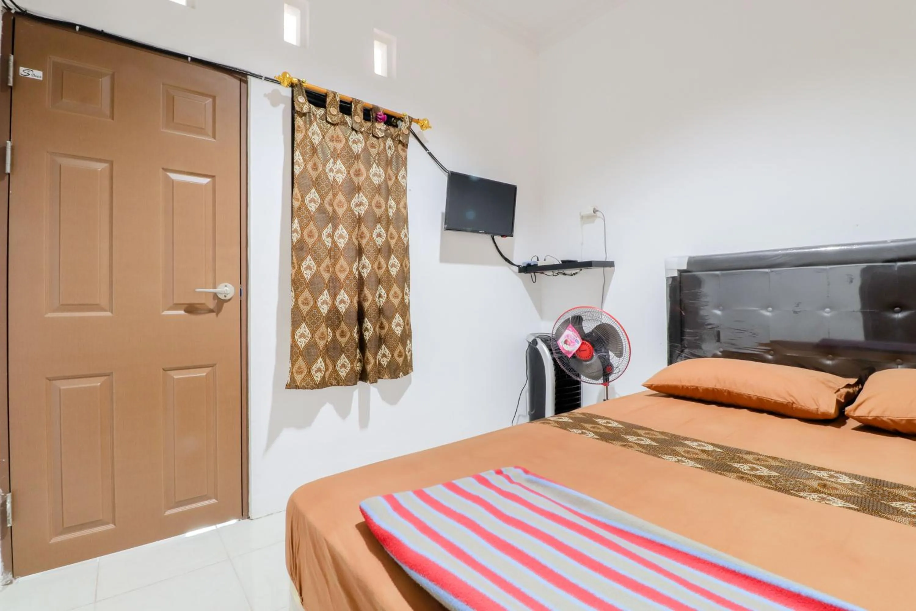 Bed in Java Homestay