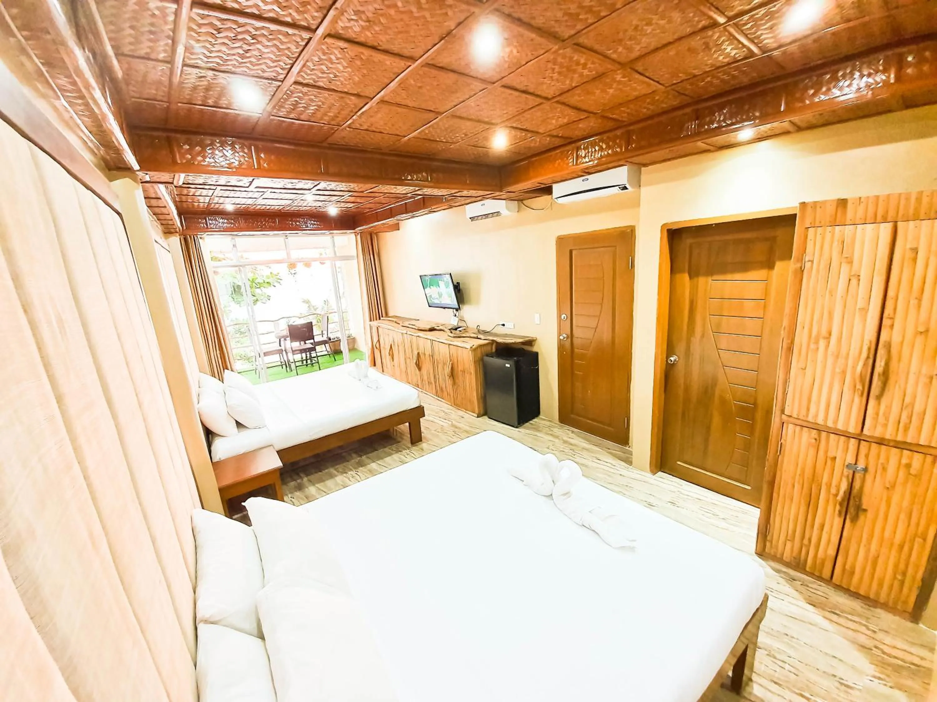 Bed in Kaiyana Boracay Beach Resort