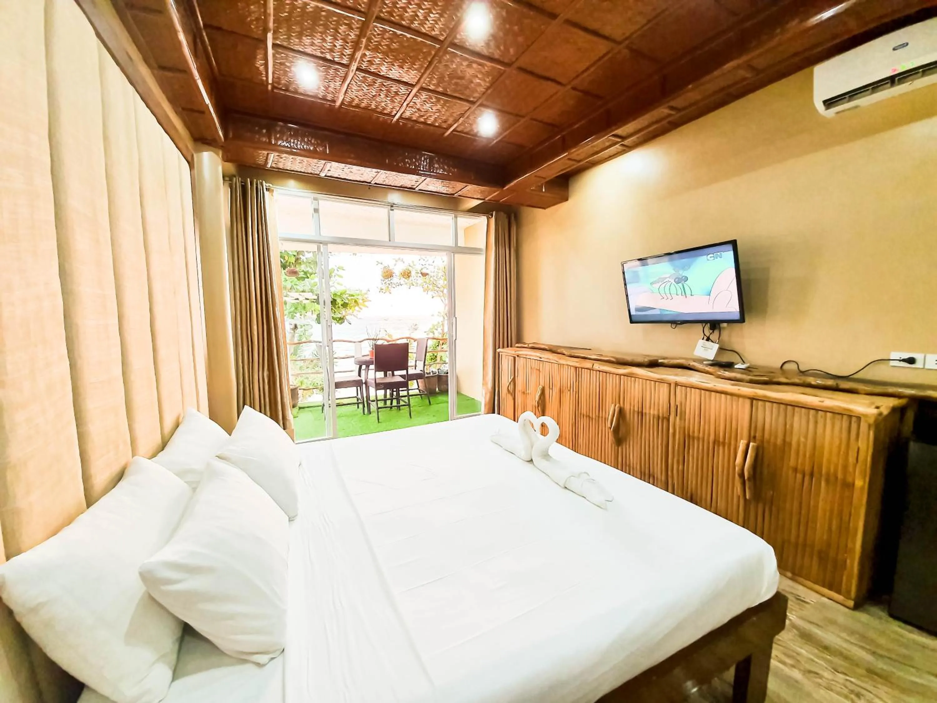 Patio, Bed in Kaiyana Boracay Beach Resort