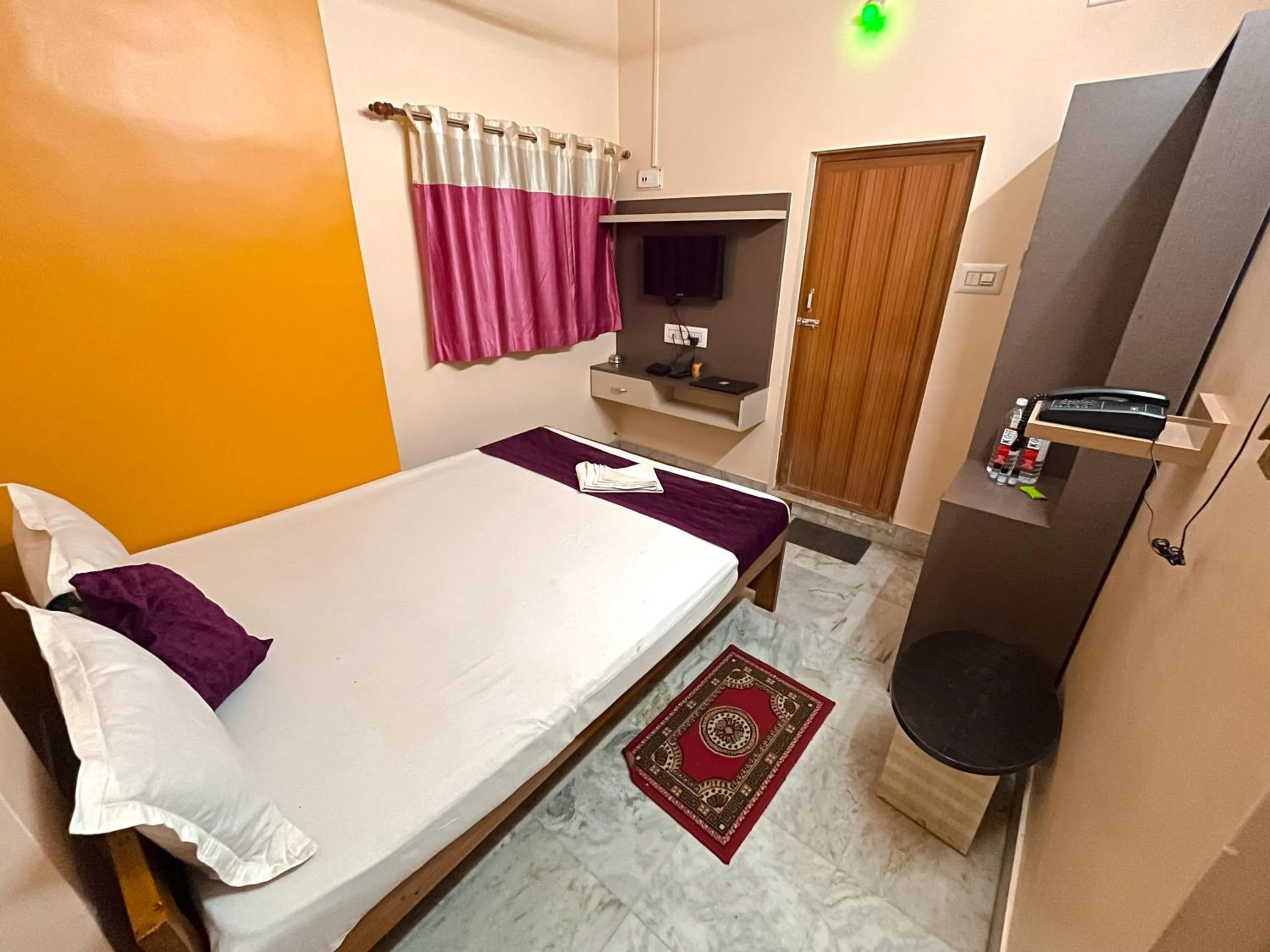 Photo of the whole room, Bed in Kristi Guest House, Shantiniketan