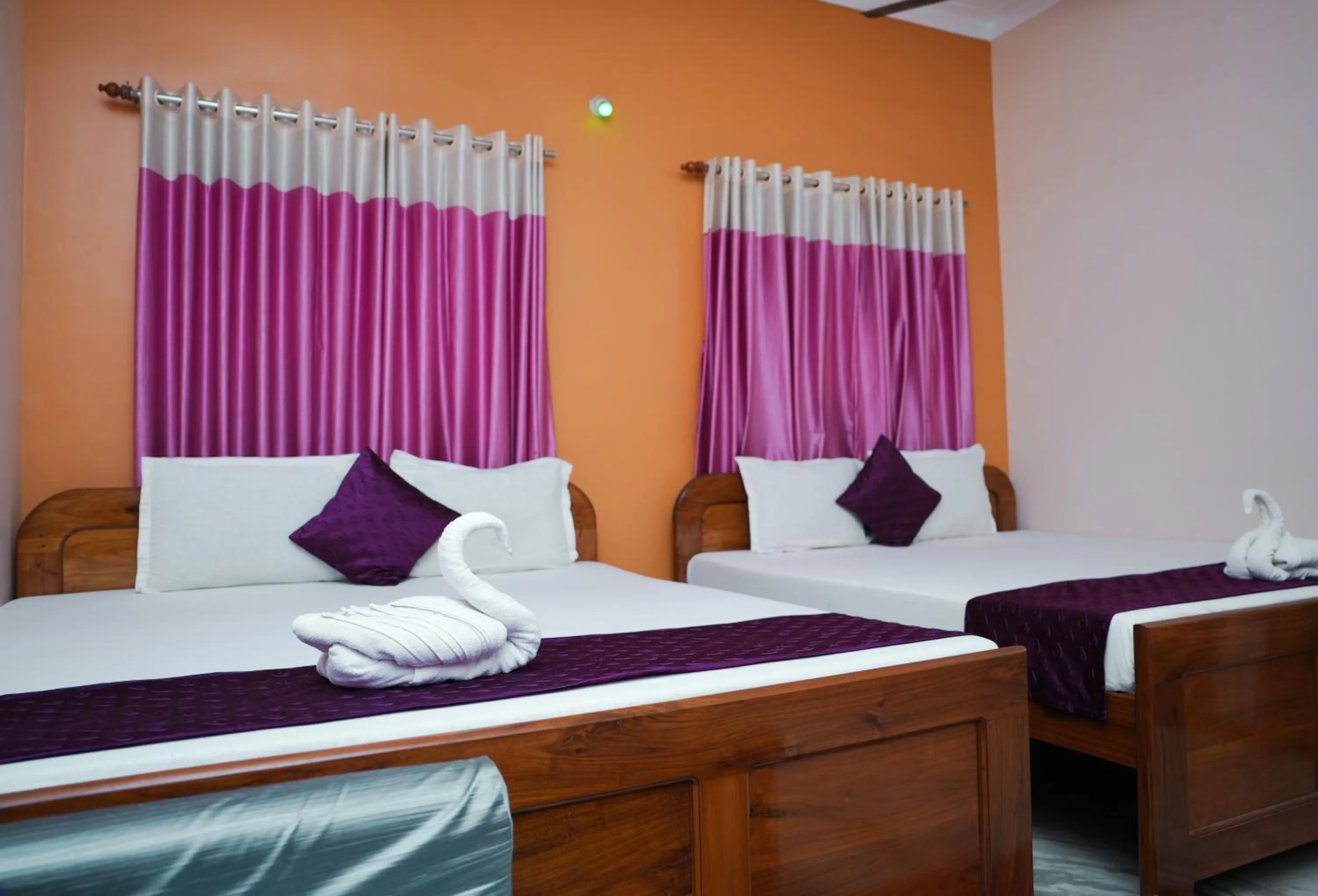 Photo of the whole room, Bed in Kristi Guest House, Shantiniketan