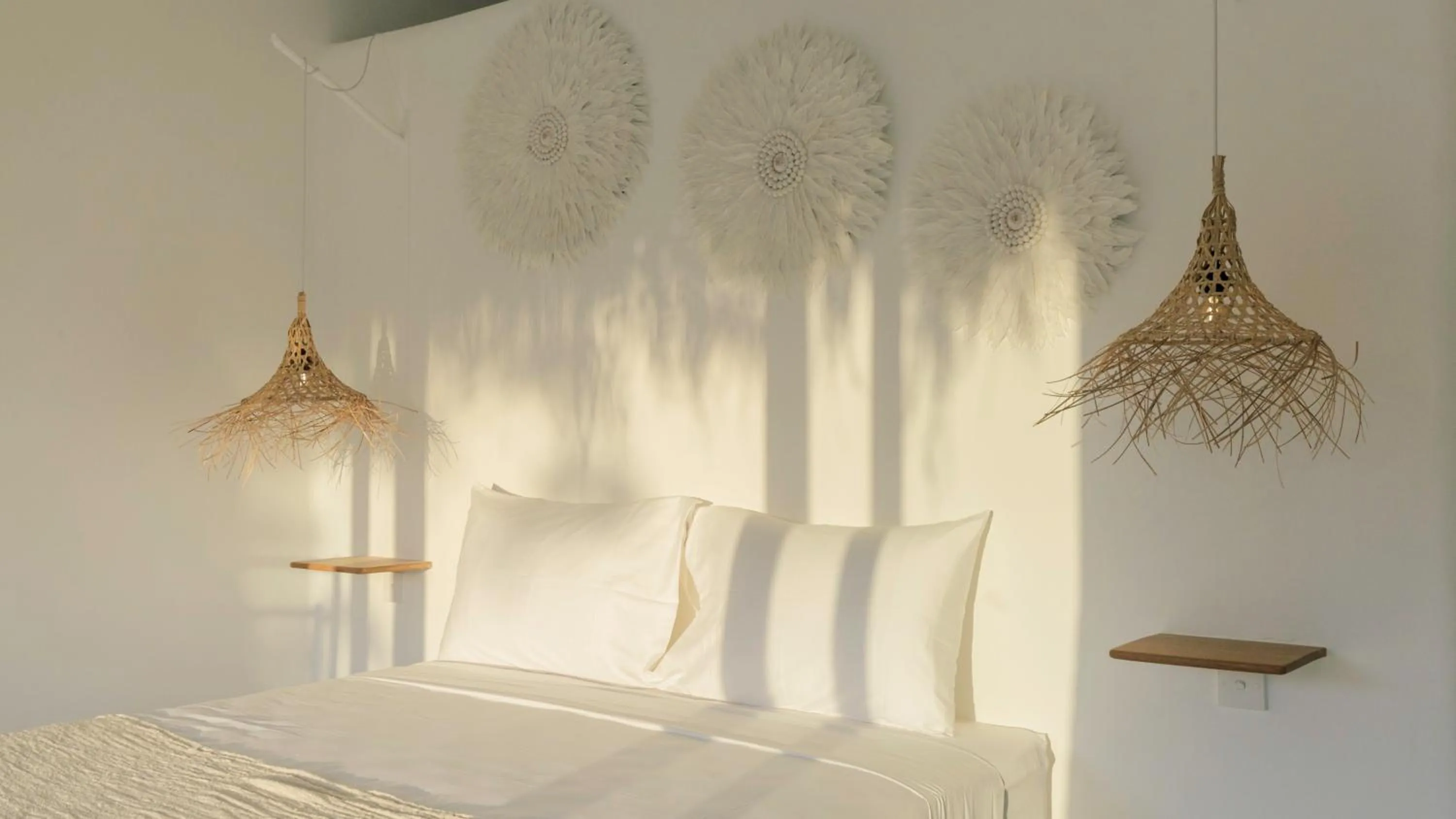 Bed in The Bingin Beach Villas' Bungalow Resort