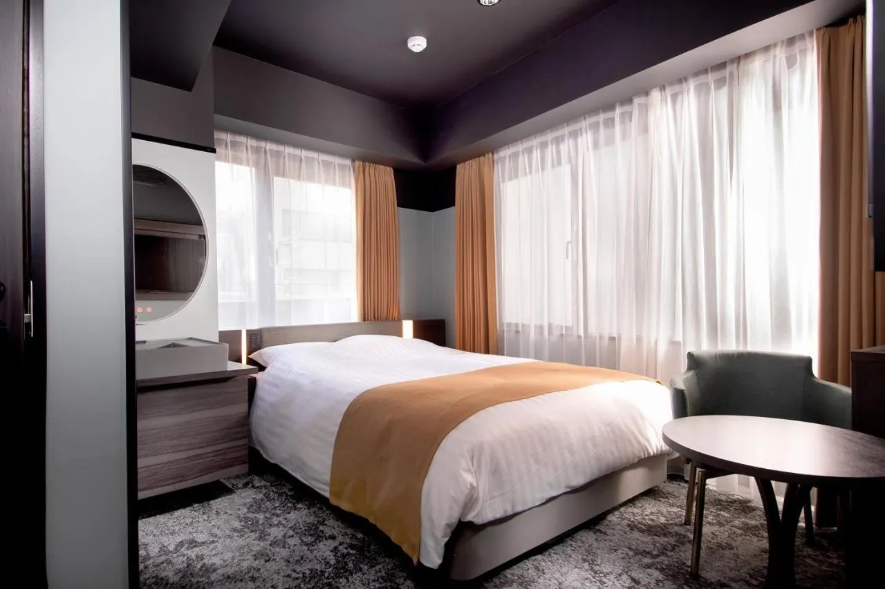 Bed in Kobe Plaza Hotel West