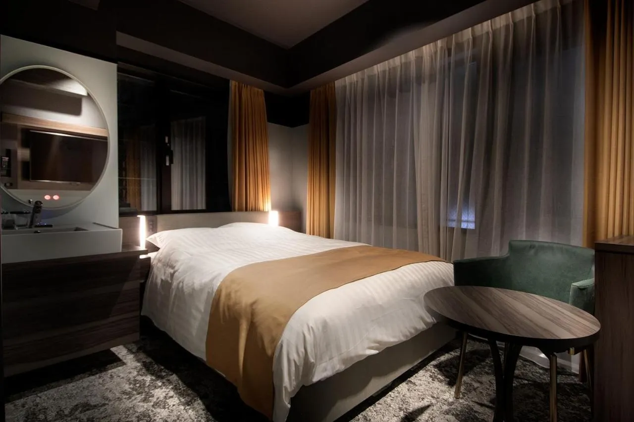 Bed in Kobe Plaza Hotel West