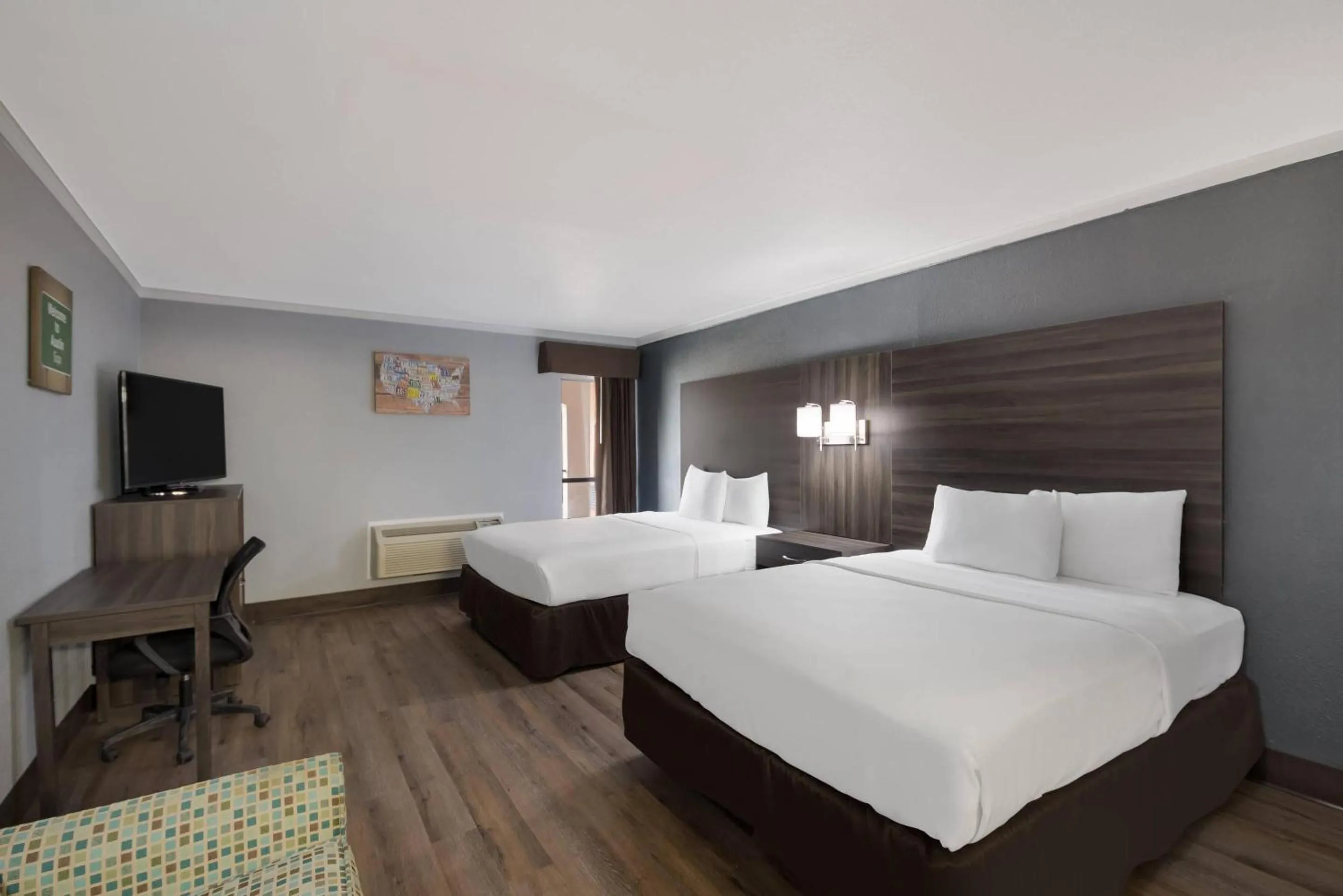 Bedroom, Bed in Econo Lodge Austin North near The Domain