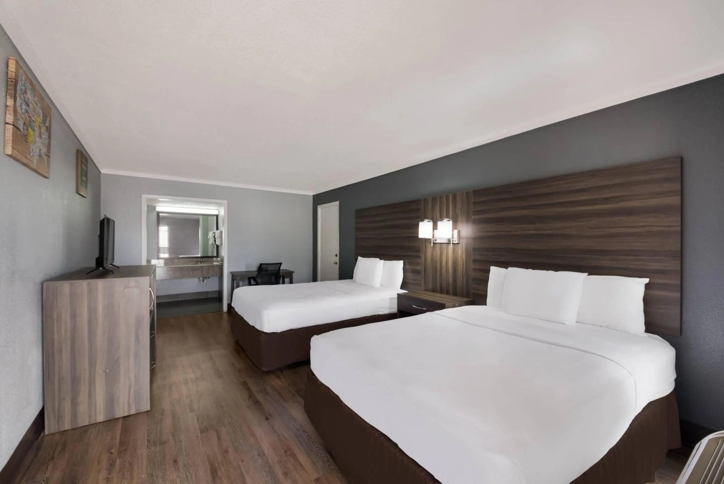 Bedroom, Bed in Econo Lodge Austin North near The Domain