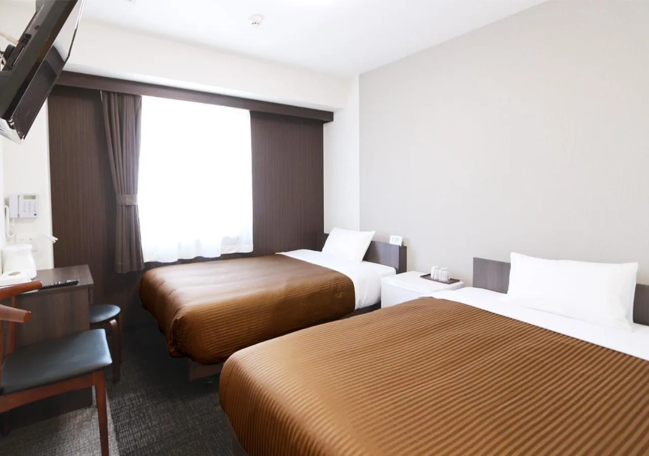 Photo of the whole room, Bed in Hotel Trend Numazu Ekimae