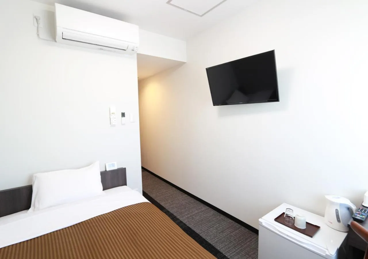 Photo of the whole room, Bed in Hotel Trend Numazu Ekimae