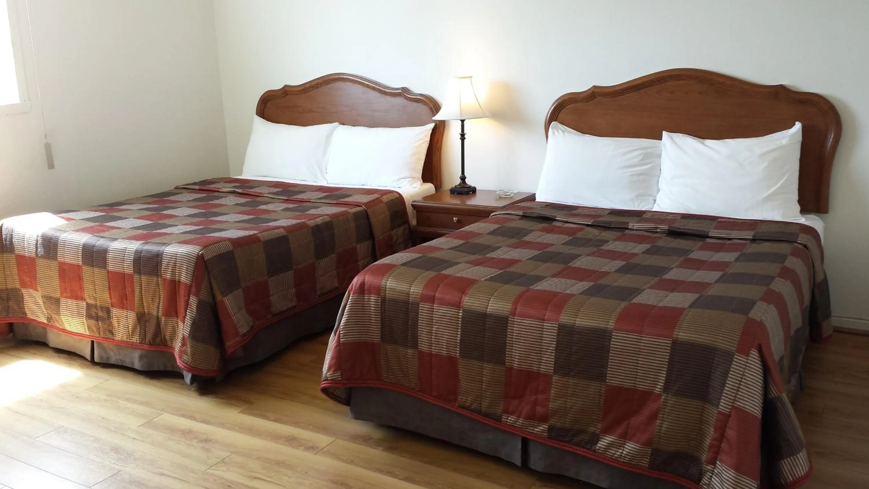 Bed in Motel Iberville