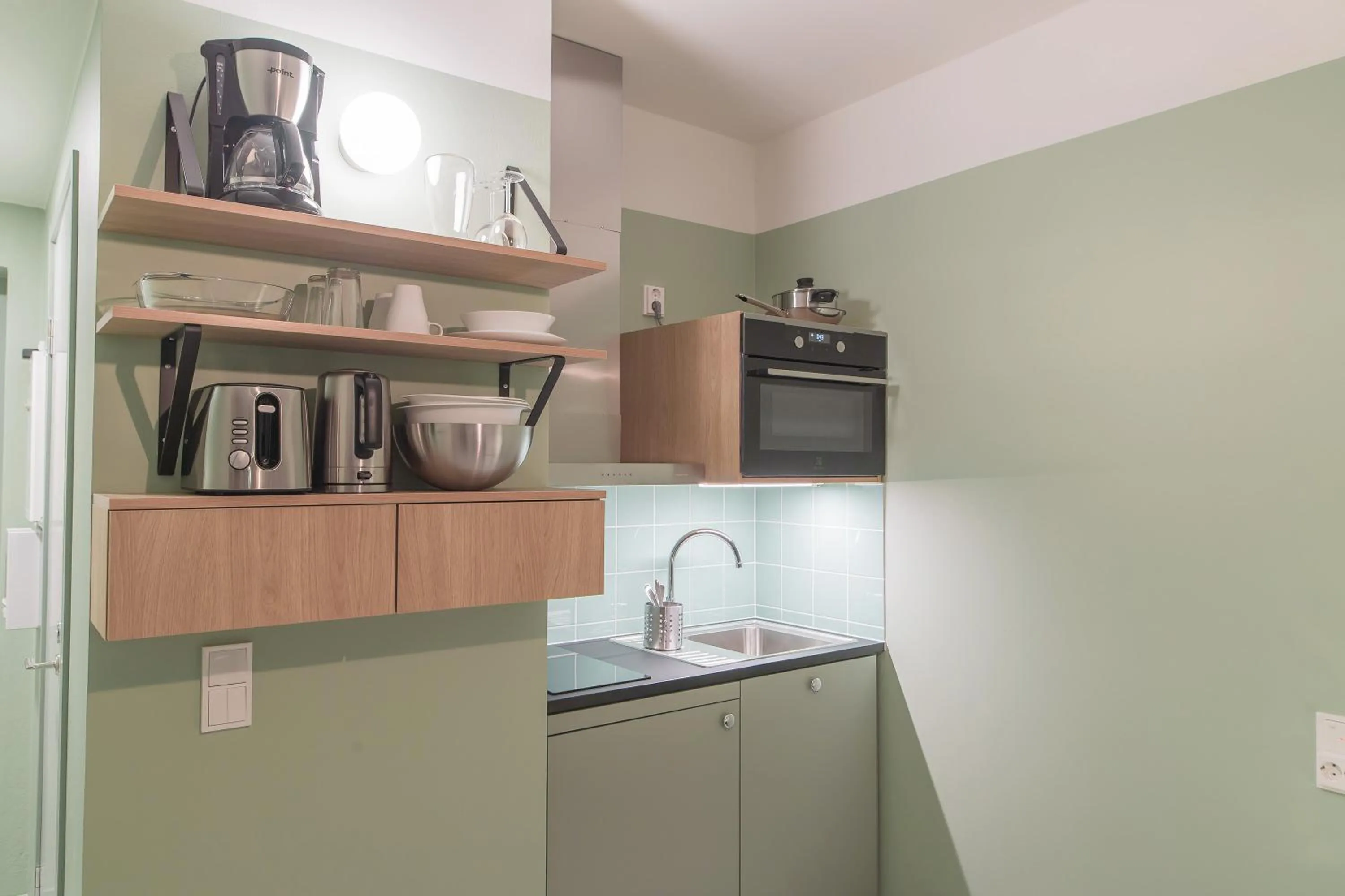 Kitchen or kitchenette in Forenom Aparthotel Jyväskylä