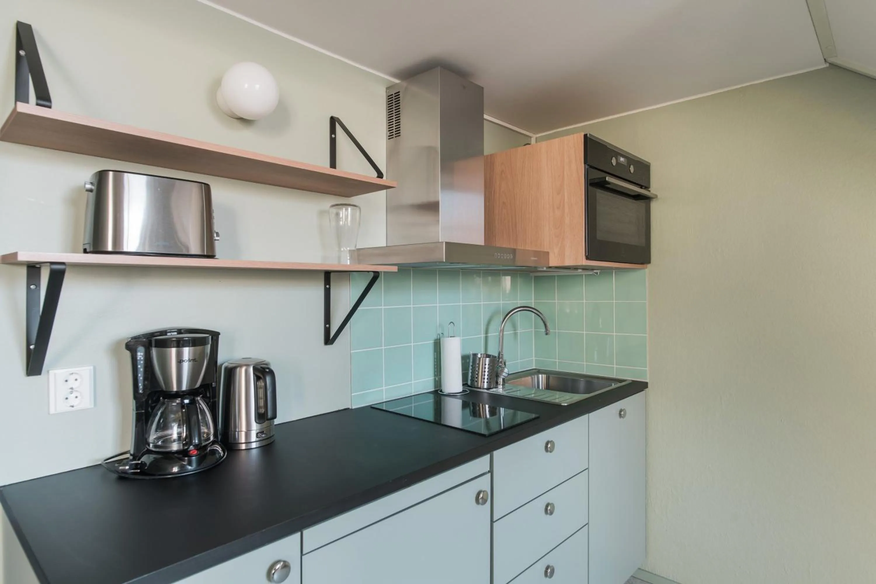 Kitchen or kitchenette in Forenom Aparthotel Jyväskylä