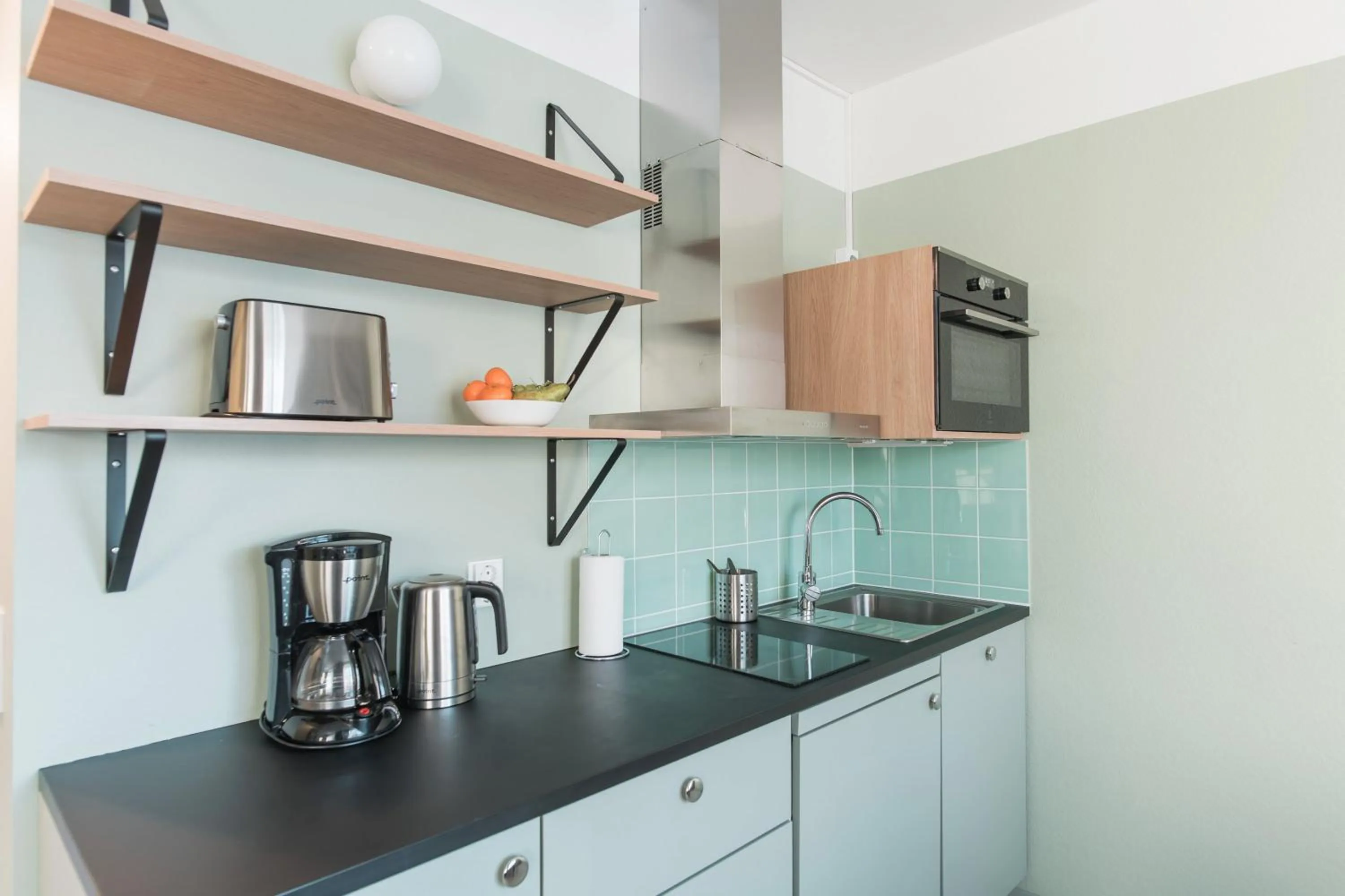 Kitchen or kitchenette in Forenom Aparthotel Jyväskylä