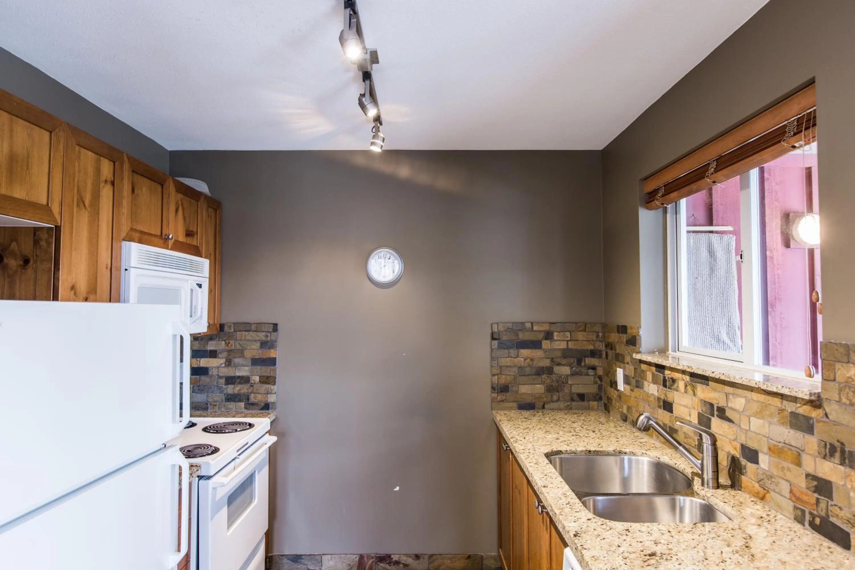 Kitchen or kitchenette in Whistler Blackcomb Vacation Rentals - Village North