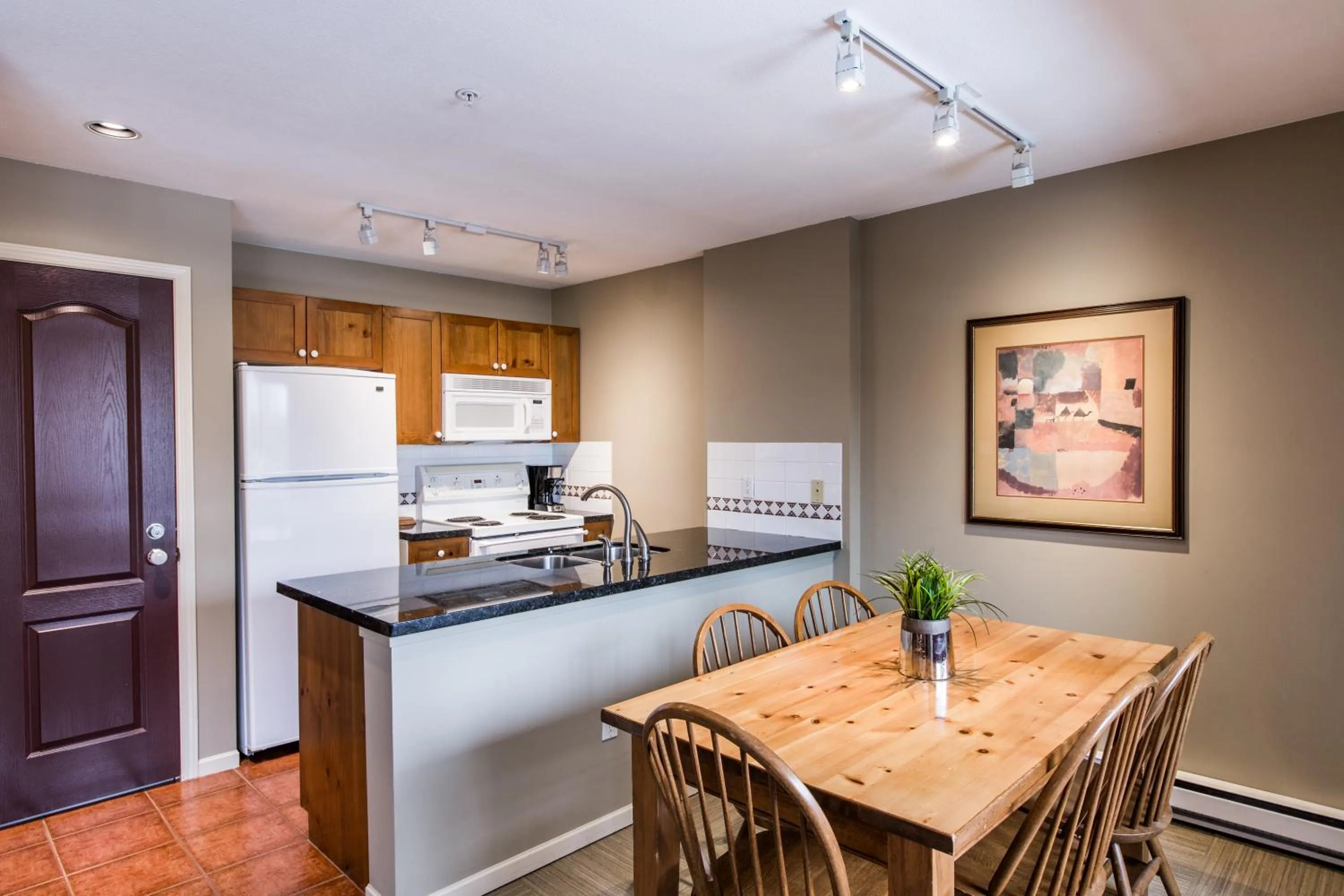 Kitchen or kitchenette in Whistler Blackcomb Vacation Rentals - Village North