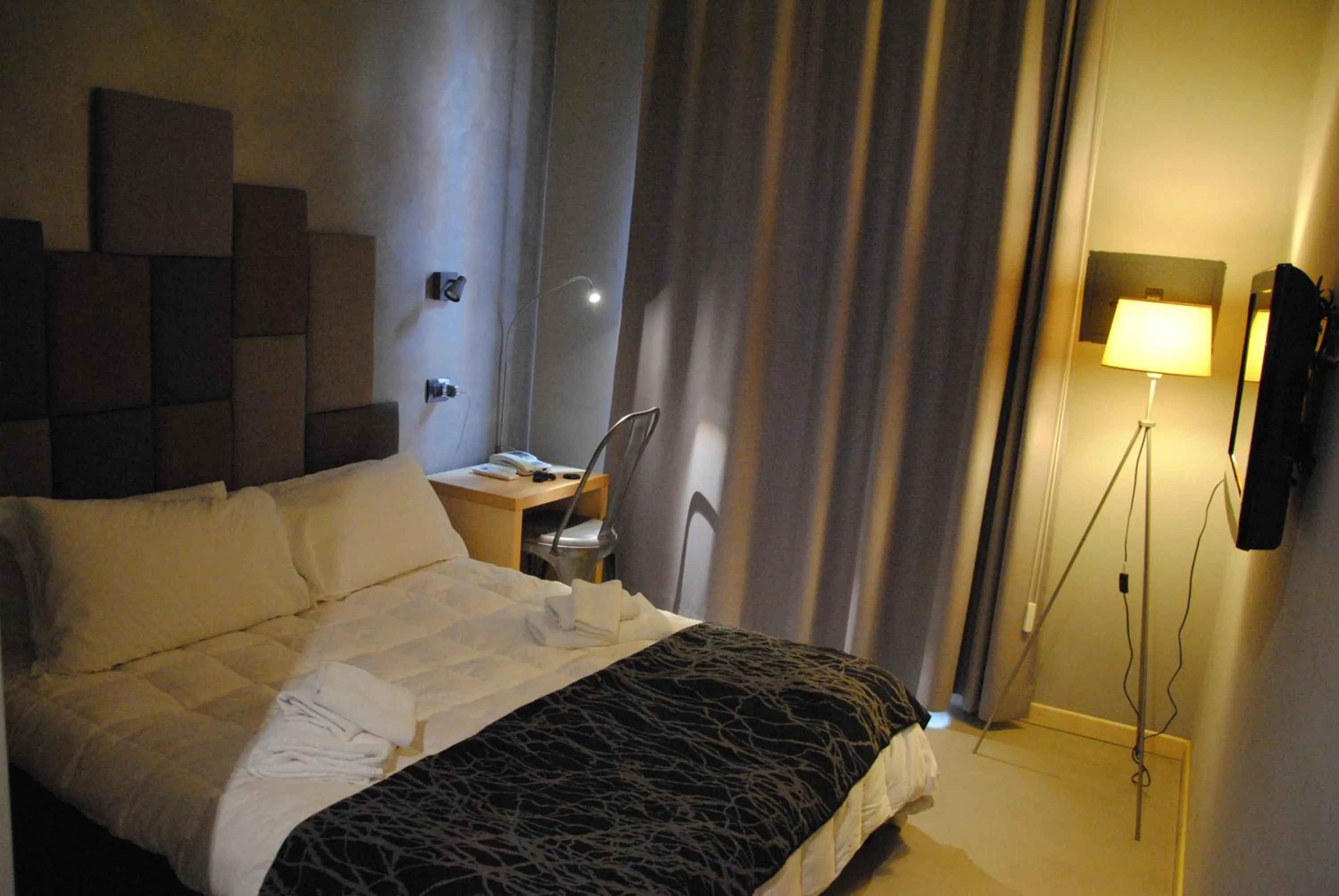 Photo of the whole room, Bed in White Vatican