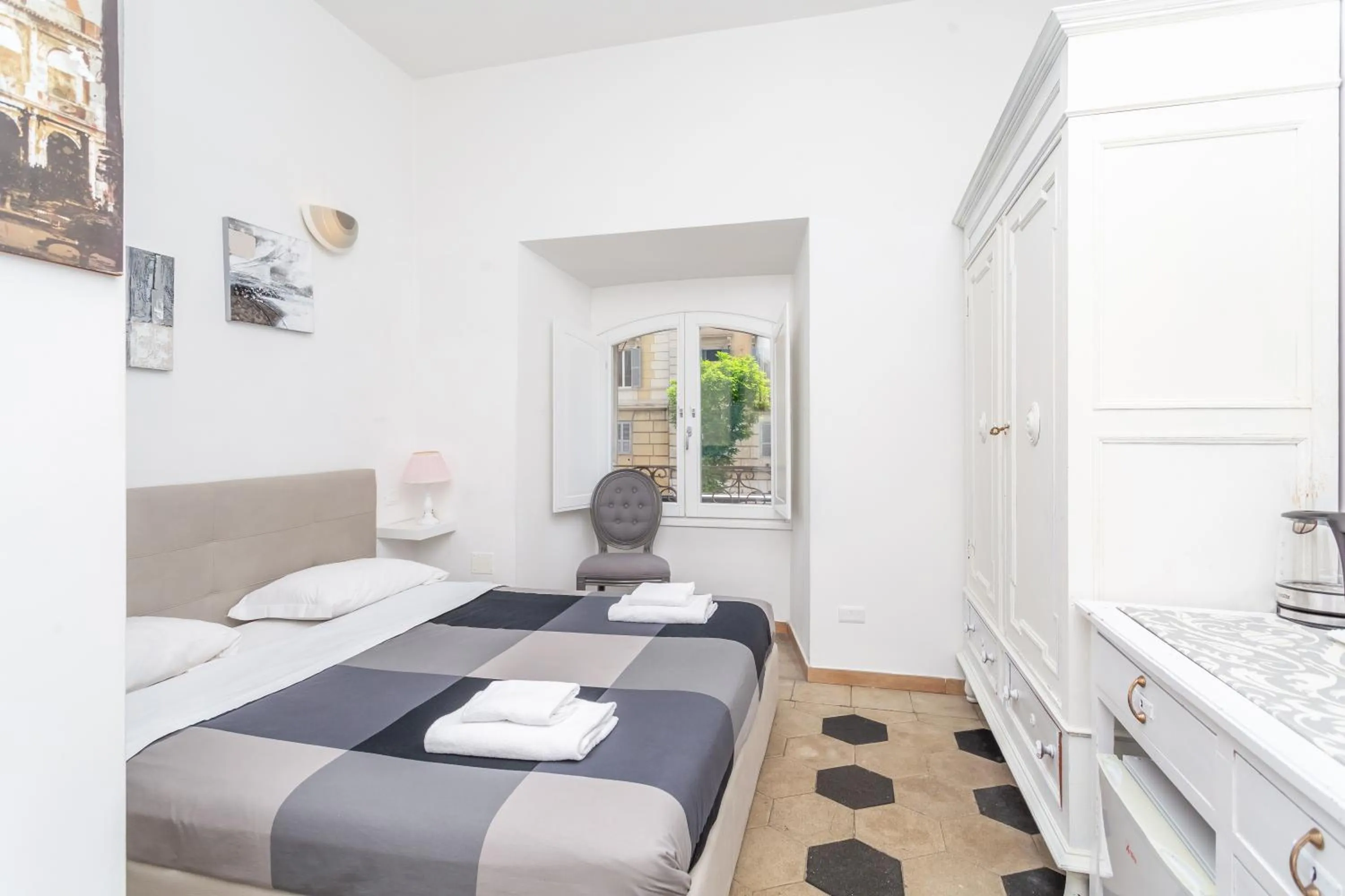 Photo of the whole room, Bed in White Vatican