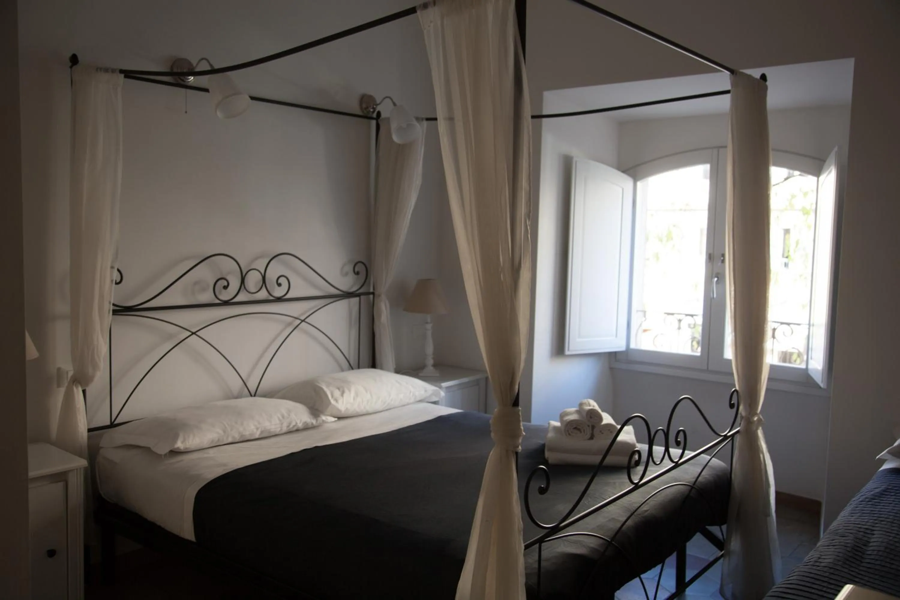 Photo of the whole room, Bed in White Vatican