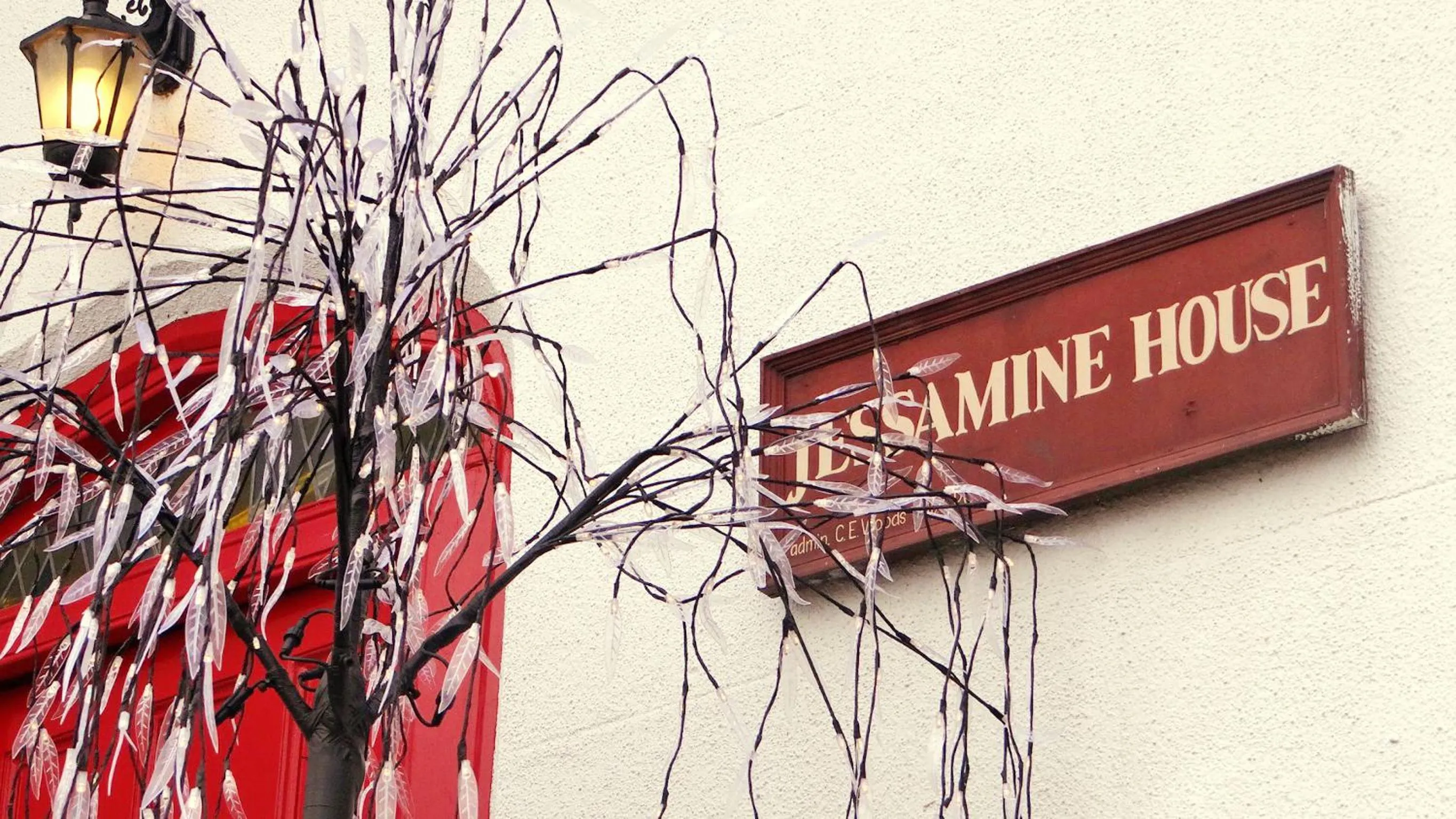 Property logo or sign in Jessamine House Hotel