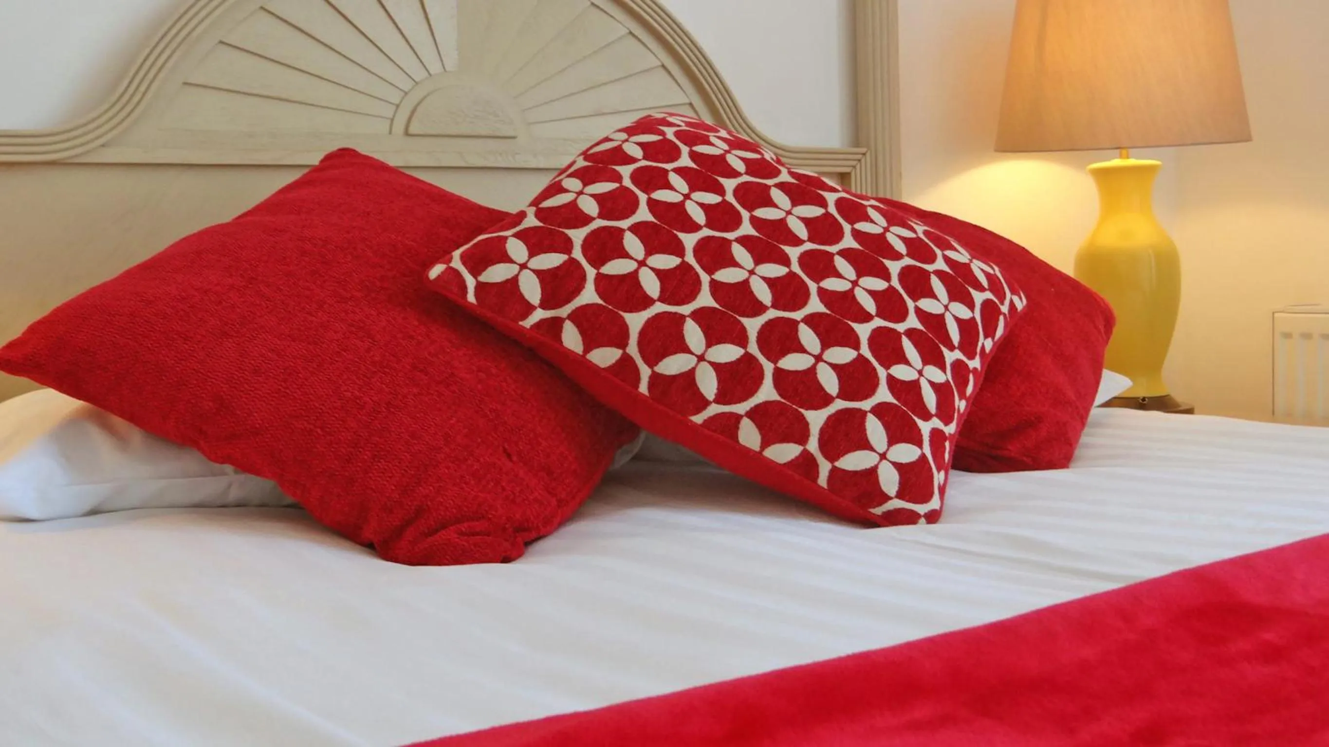 Bed in Jessamine House Hotel