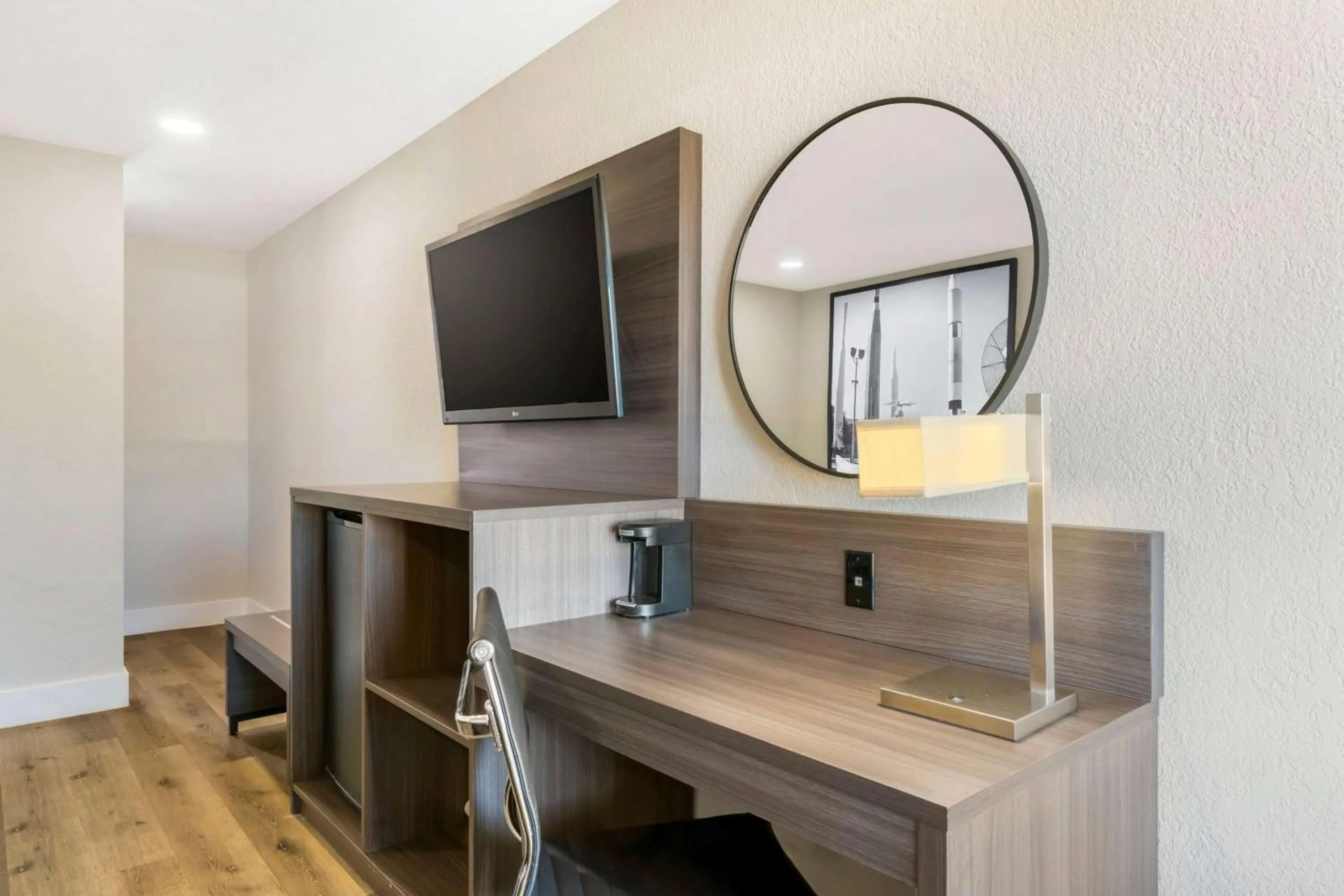 Photo of the whole room in Super 8 by Wyndham Orlando Near Florida Mall