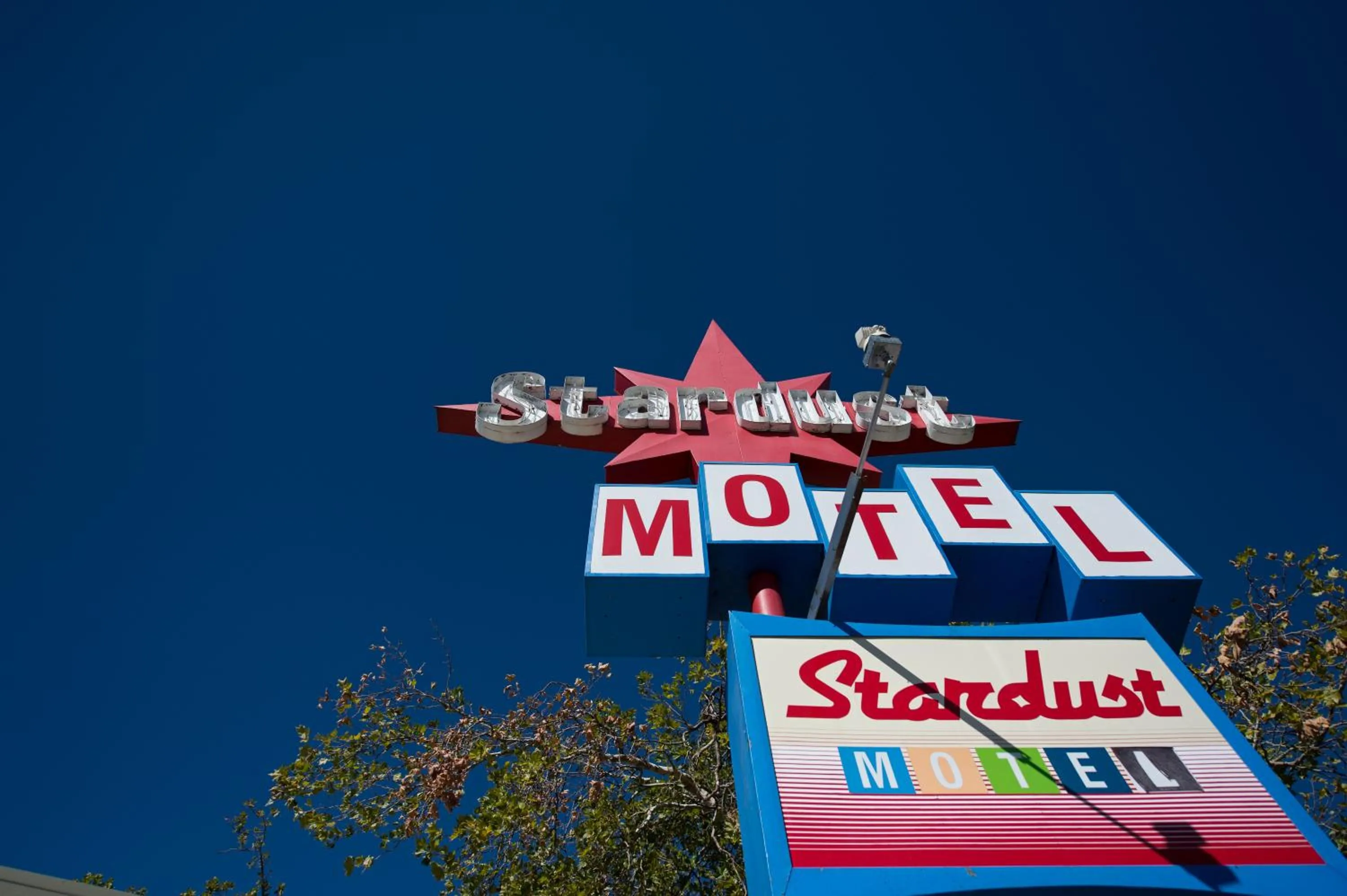 Property logo or sign in Stardust Motel