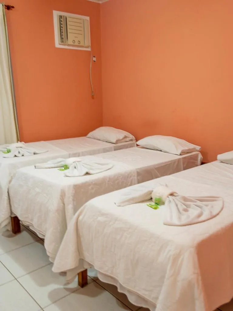 Bed in Pousada Estrada do Ouro