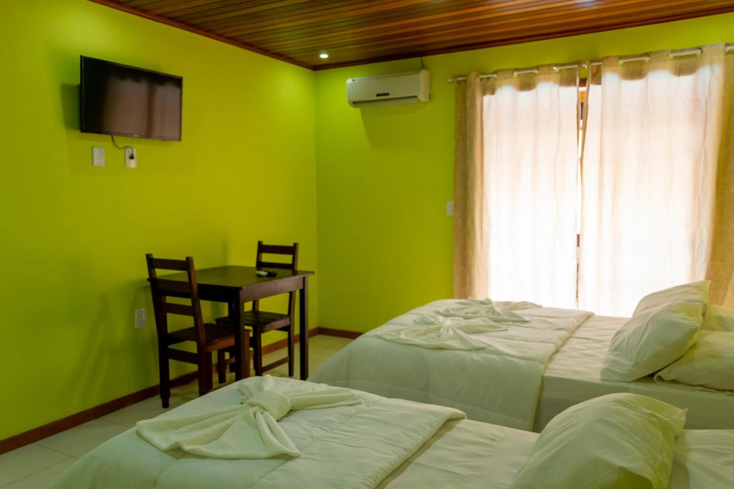 Bed in Pousada Estrada do Ouro