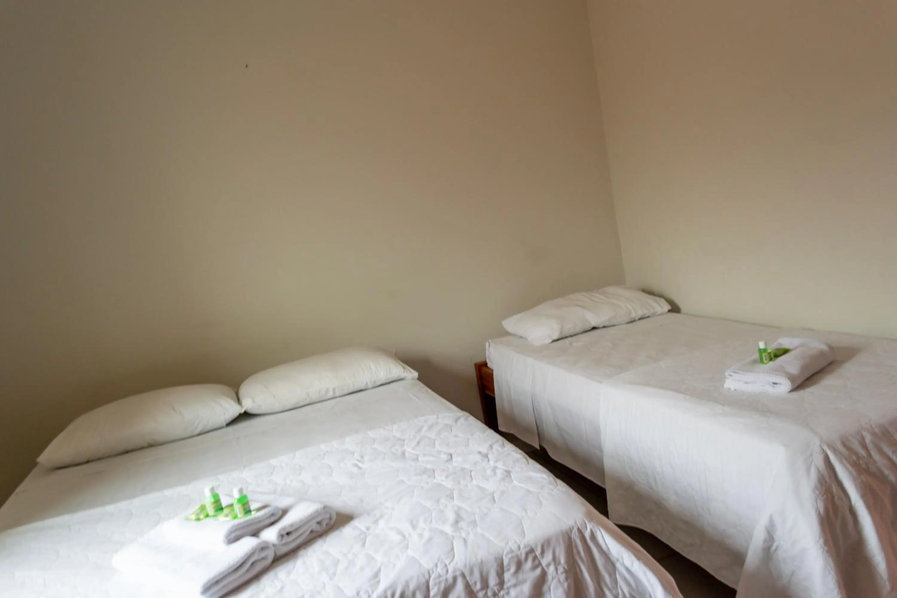 Bed in Pousada Estrada do Ouro