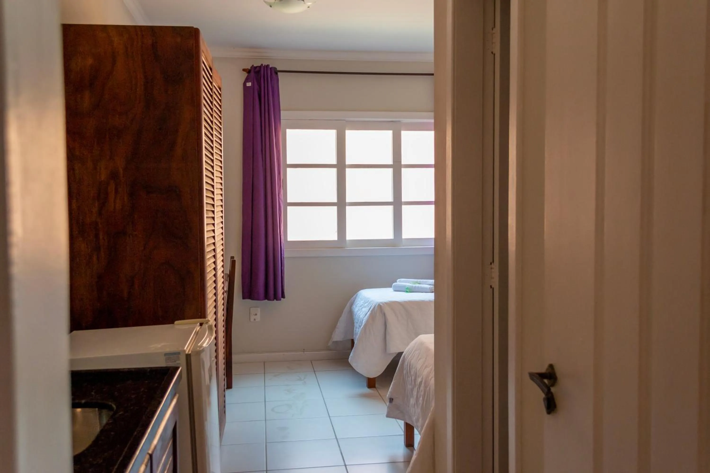 Bed in Pousada Estrada do Ouro