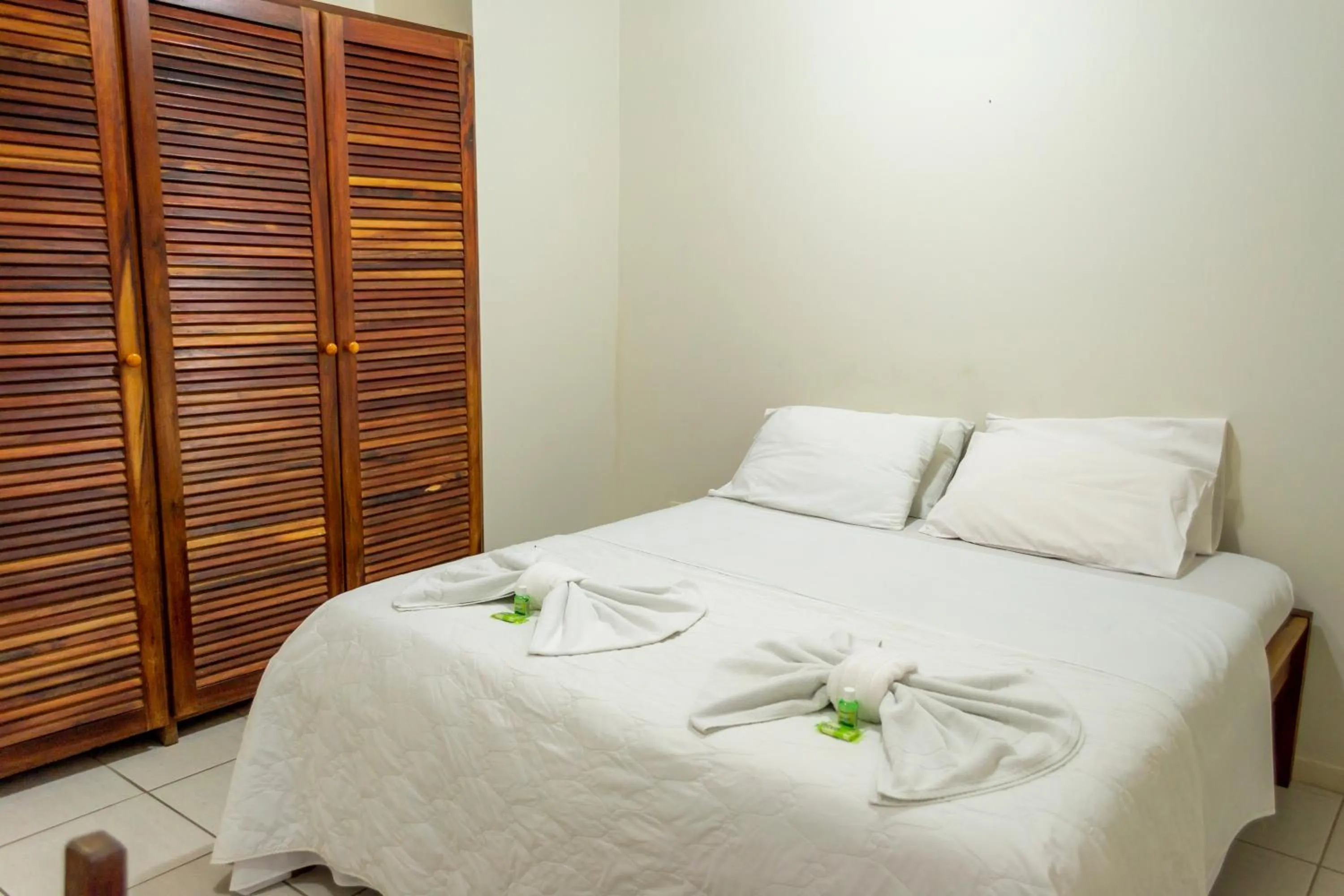 Bed in Pousada Estrada do Ouro