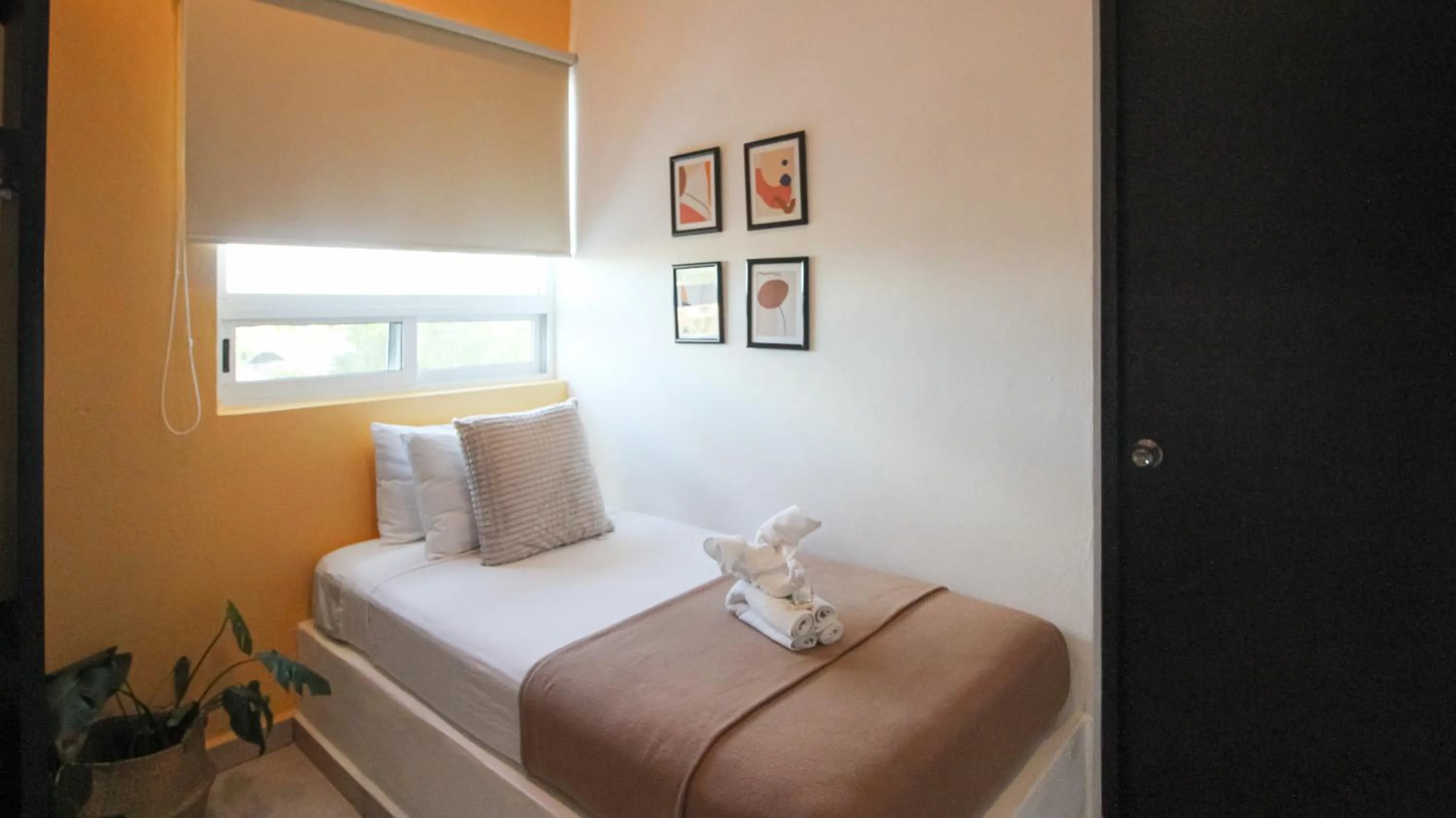 Bed in Hotel Kinyaah