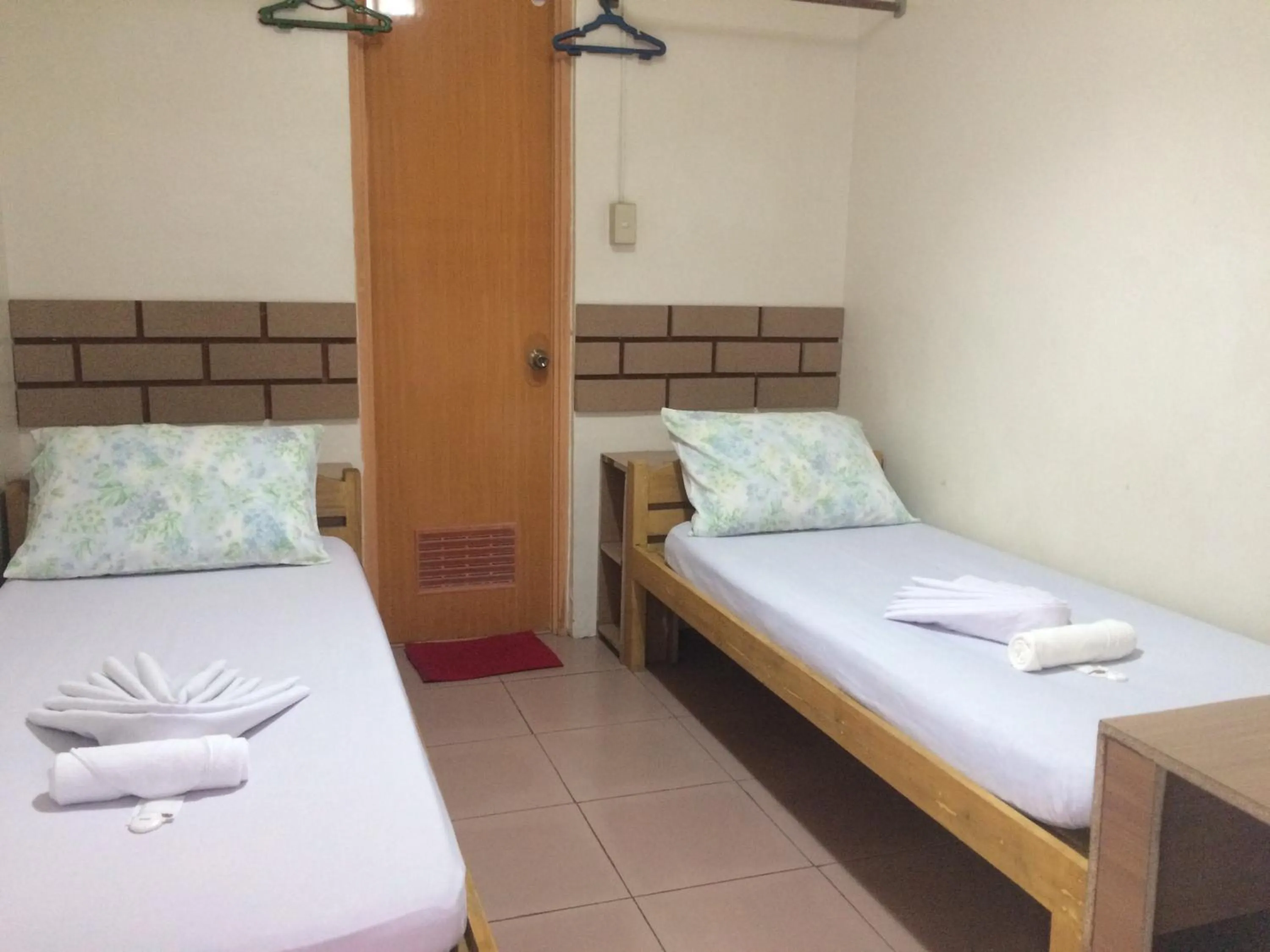 Bed in CrisFil's Lodge Incorporated