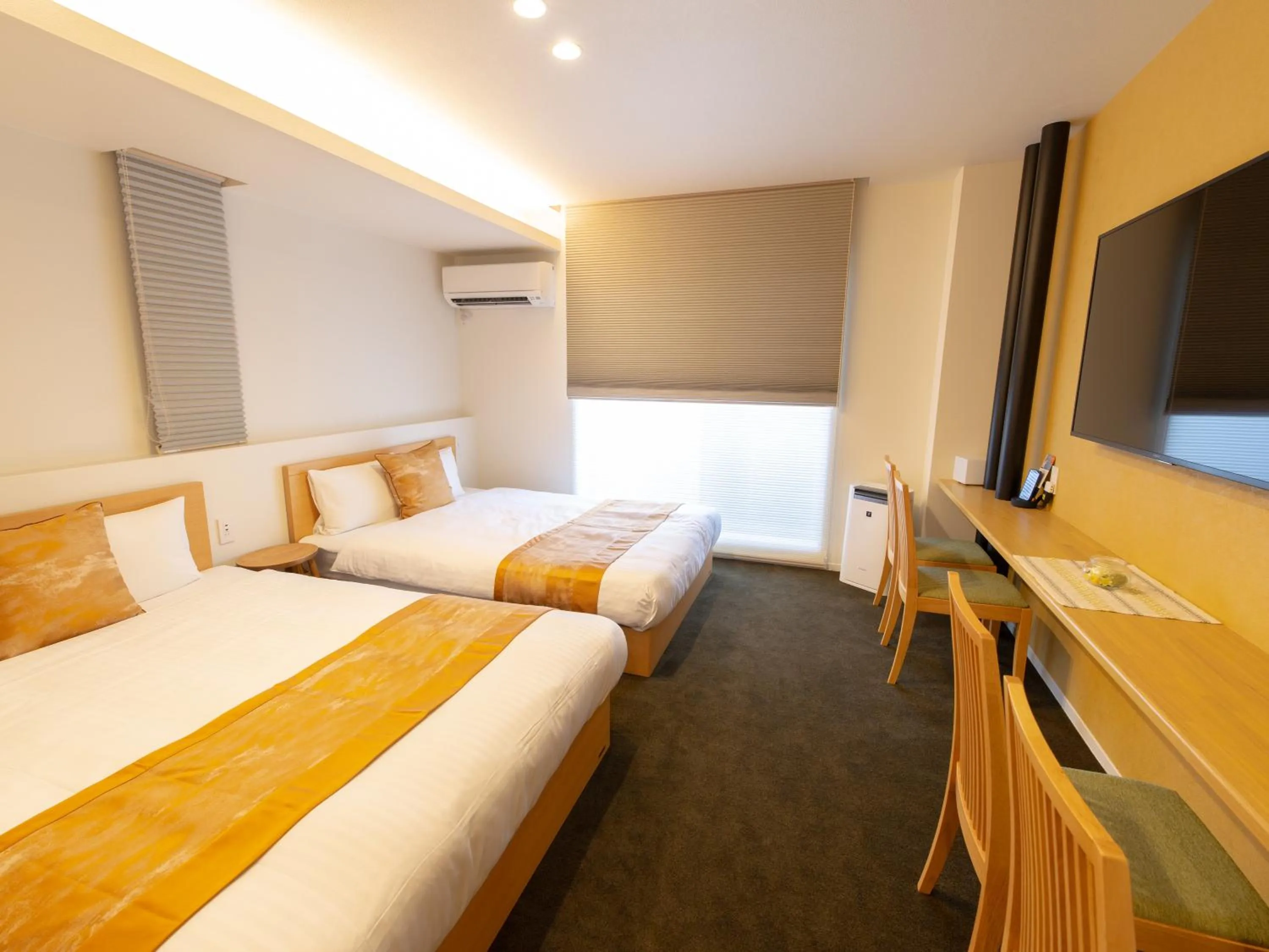 Bed in GRAND BASE Hiroshima Ekimae