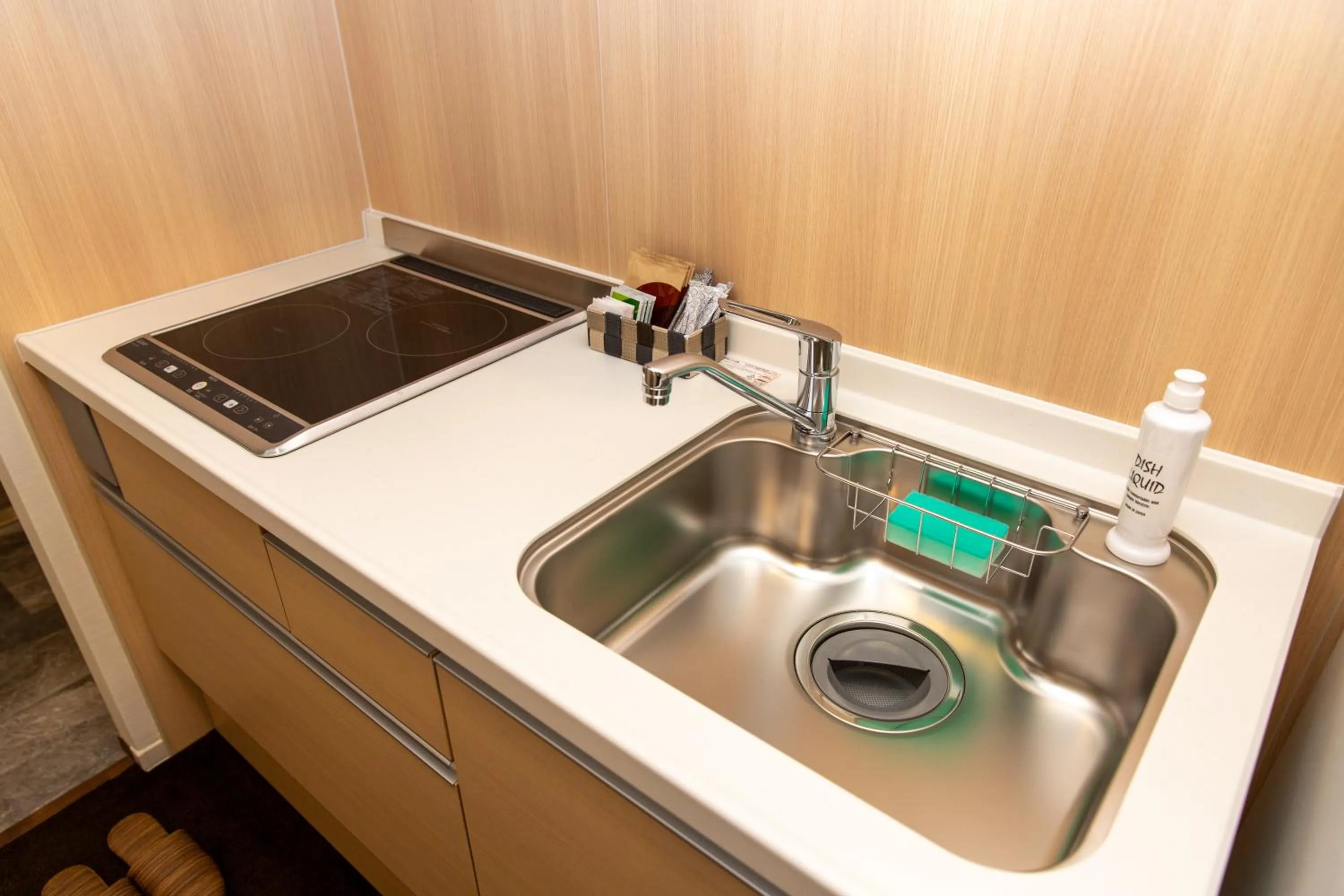 Kitchen or kitchenette in GRAND BASE Hiroshima Ekimae