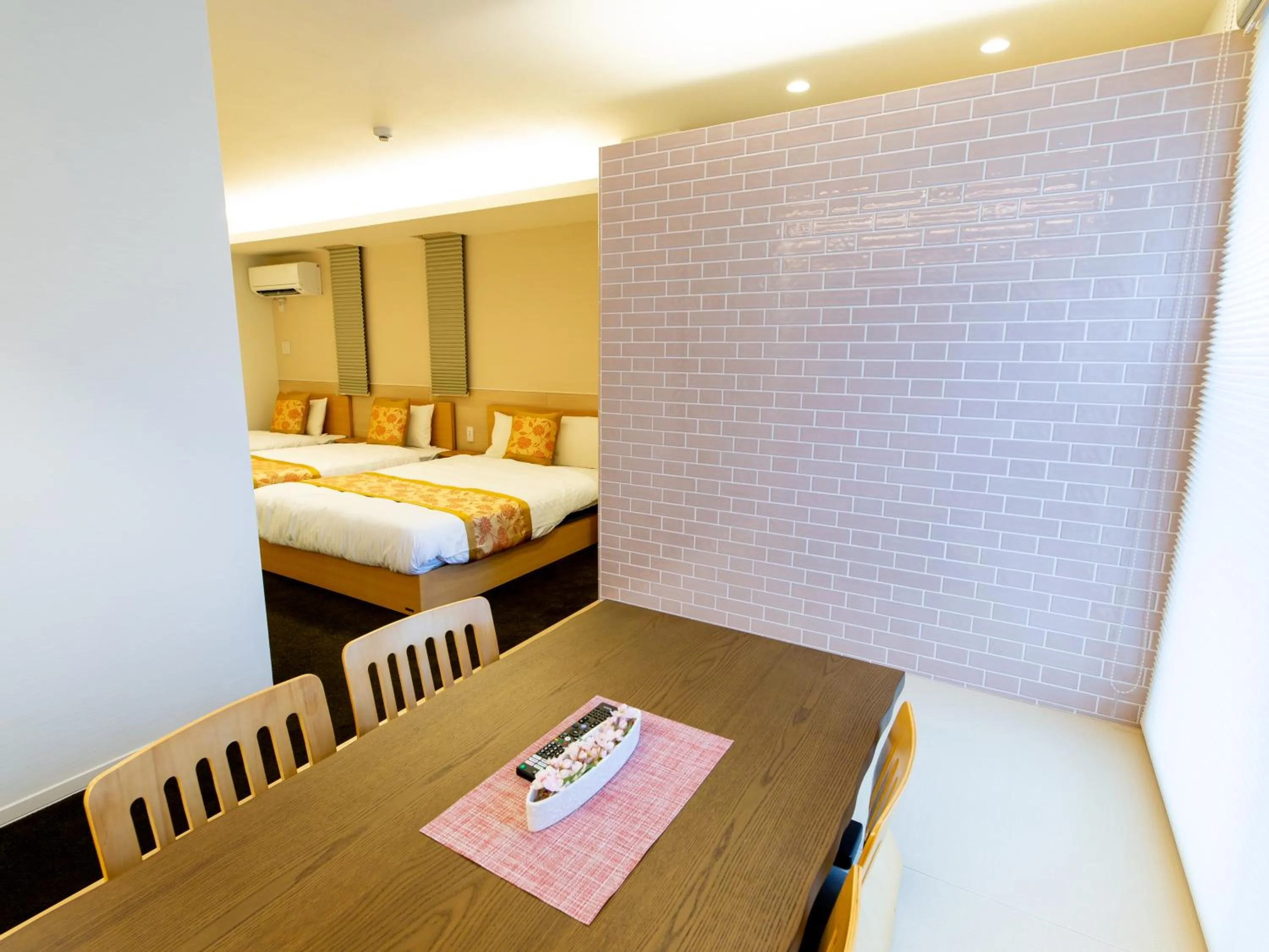 Photo of the whole room, Bed in GRAND BASE Hiroshima Ekimae